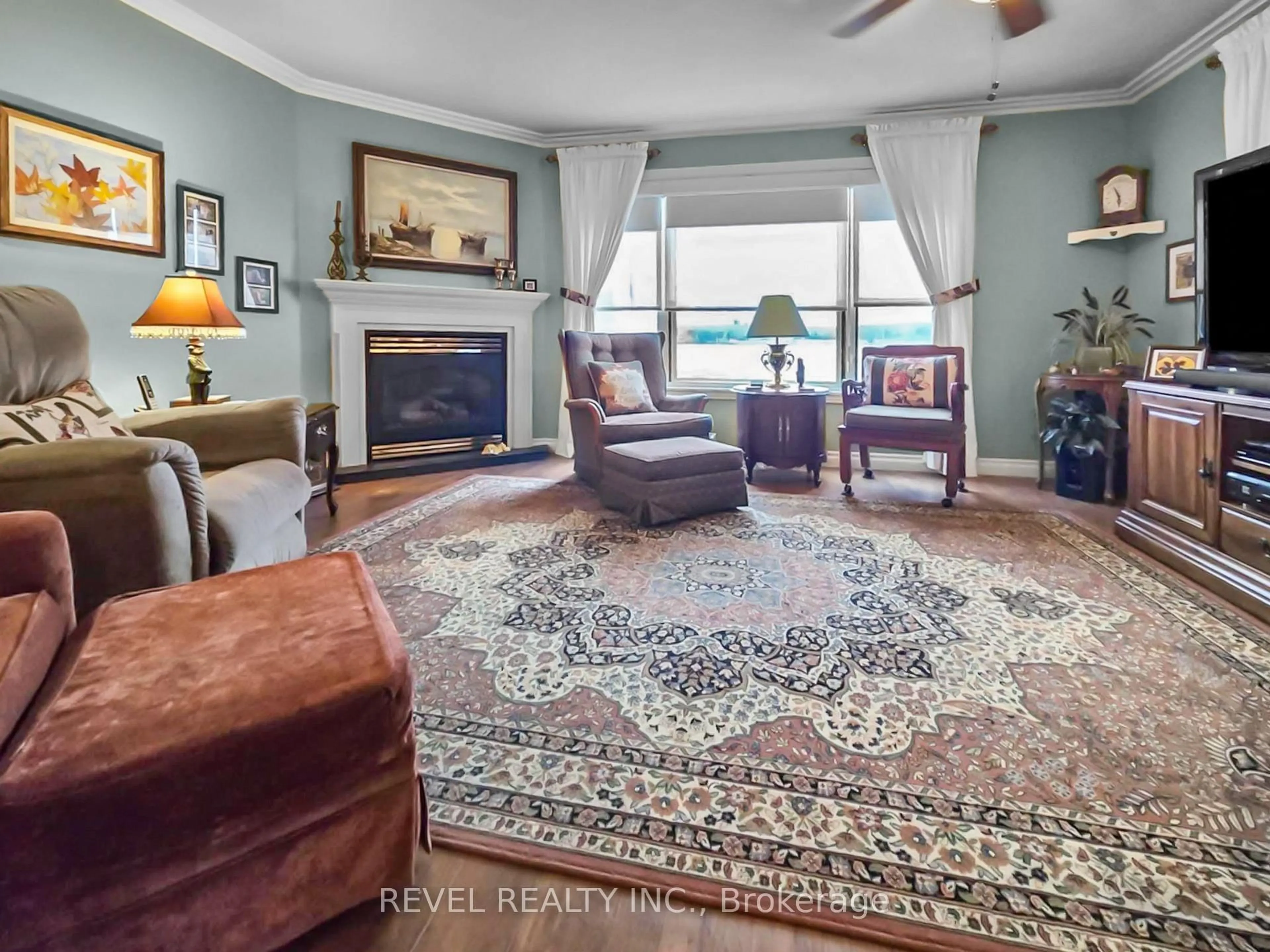 Living room with furniture, carpet floor for 406 Toke St, Timmins Ontario P4N 6V7