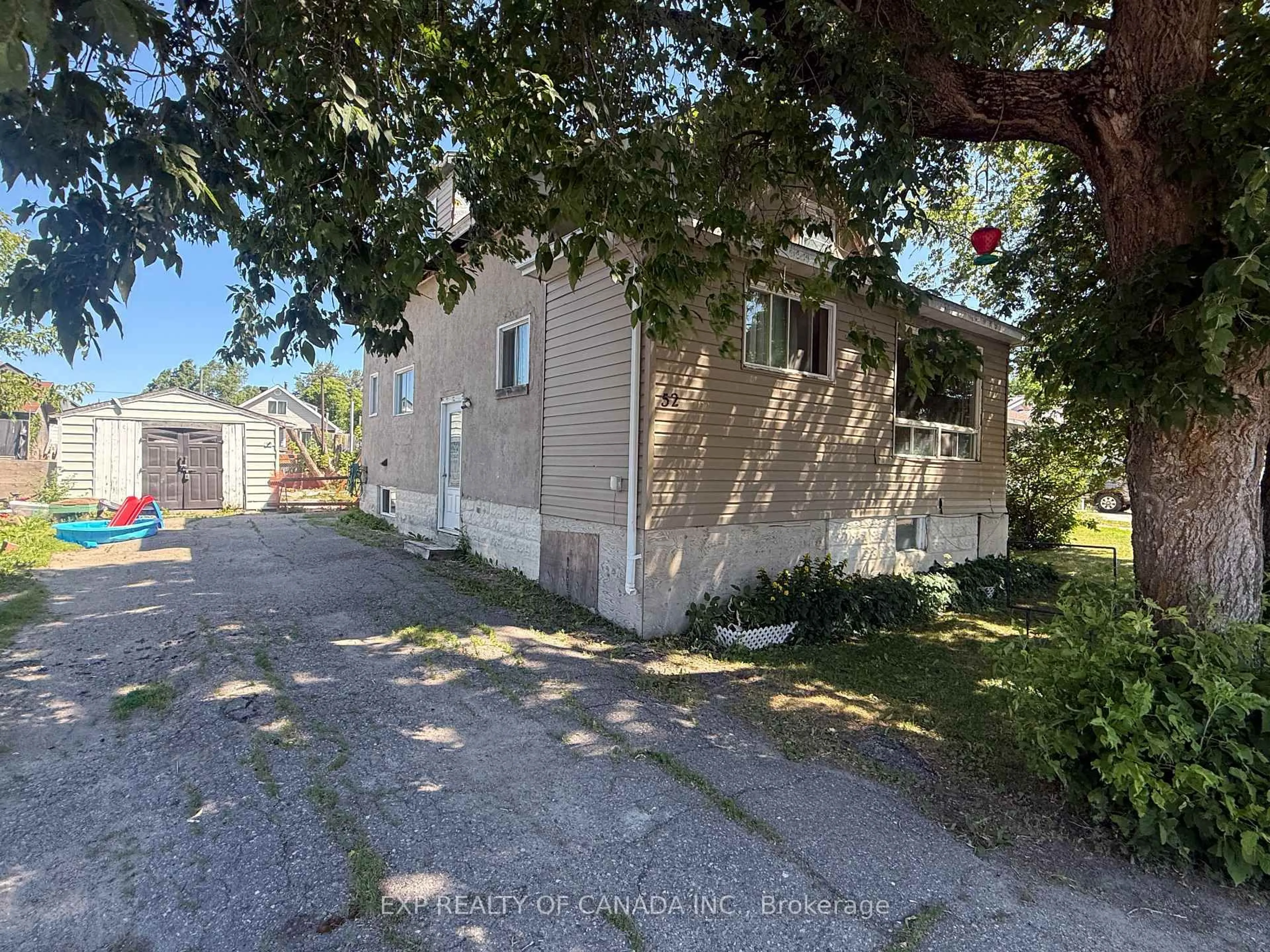 A pic from outside/outdoor area/front of a property/back of a property/a pic from drone, street for 52 Broadway Ave, Timmins Ontario P0N 1H0