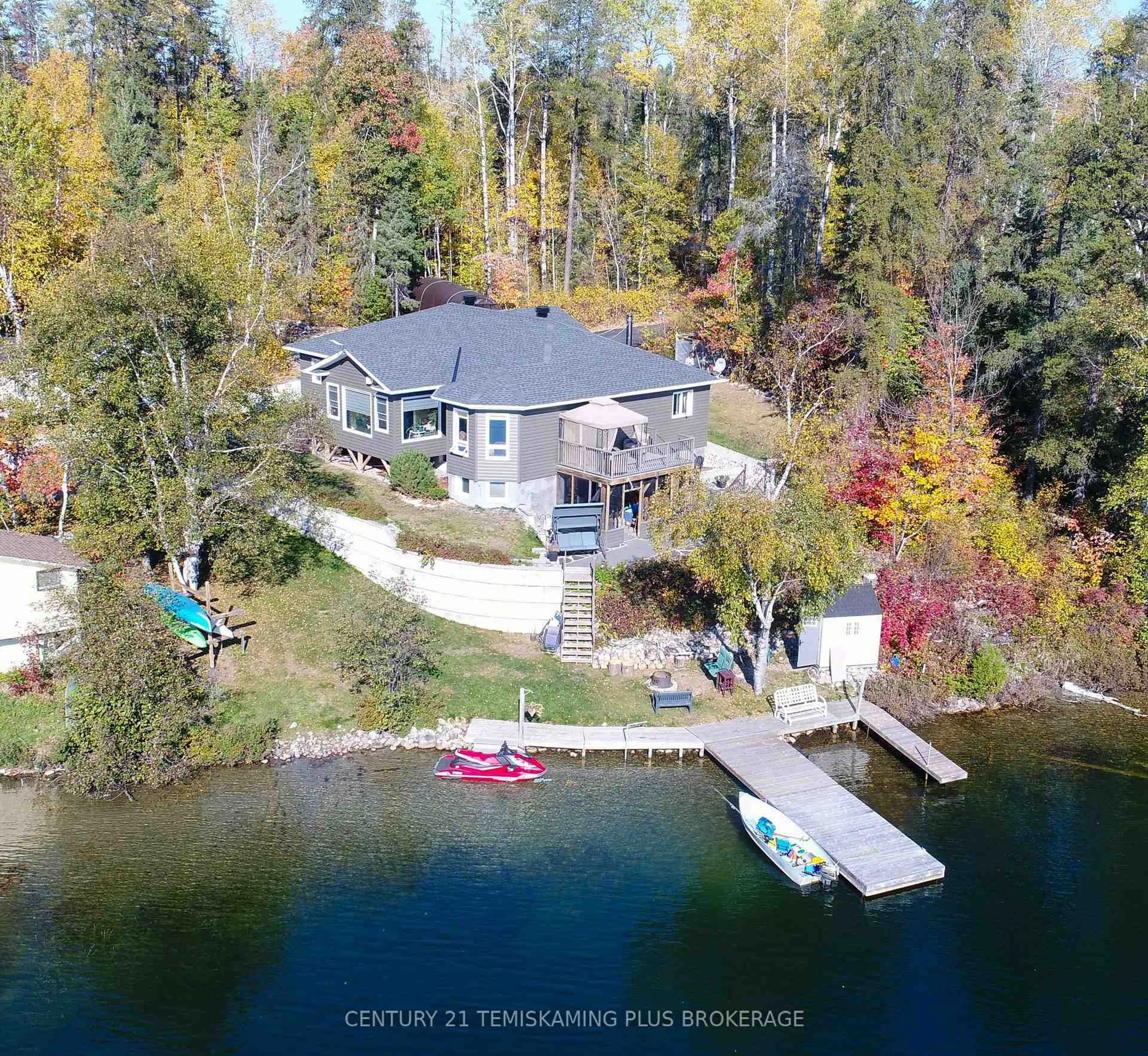 A pic from outside/outdoor area/front of a property/back of a property/a pic from drone, water/lake/river/ocean view for 1188 Twin Lakes - A Rd, Timiskaming Ontario P0J 1P0