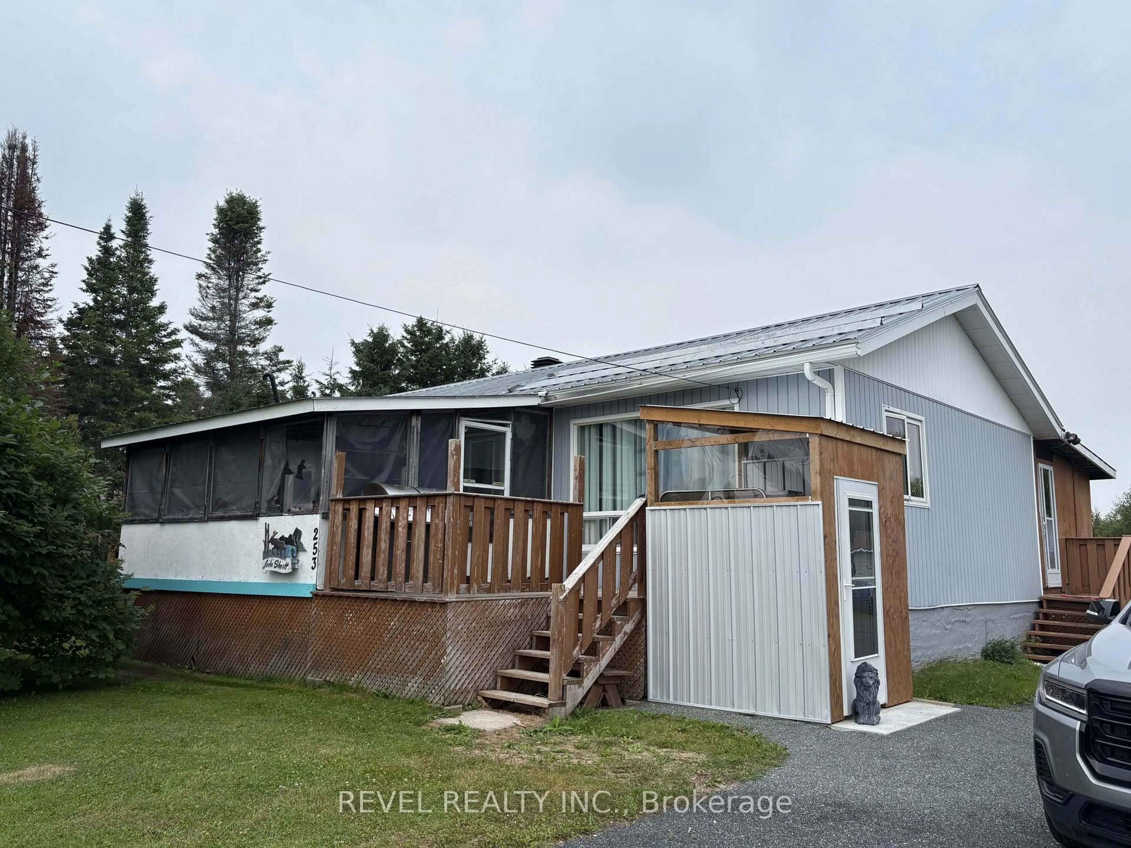 A pic from outside/outdoor area/front of a property/back of a property/a pic from drone, water/lake/river/ocean view for 253 Highway 11 Highway, Cochrane Ontario P0L 1C0