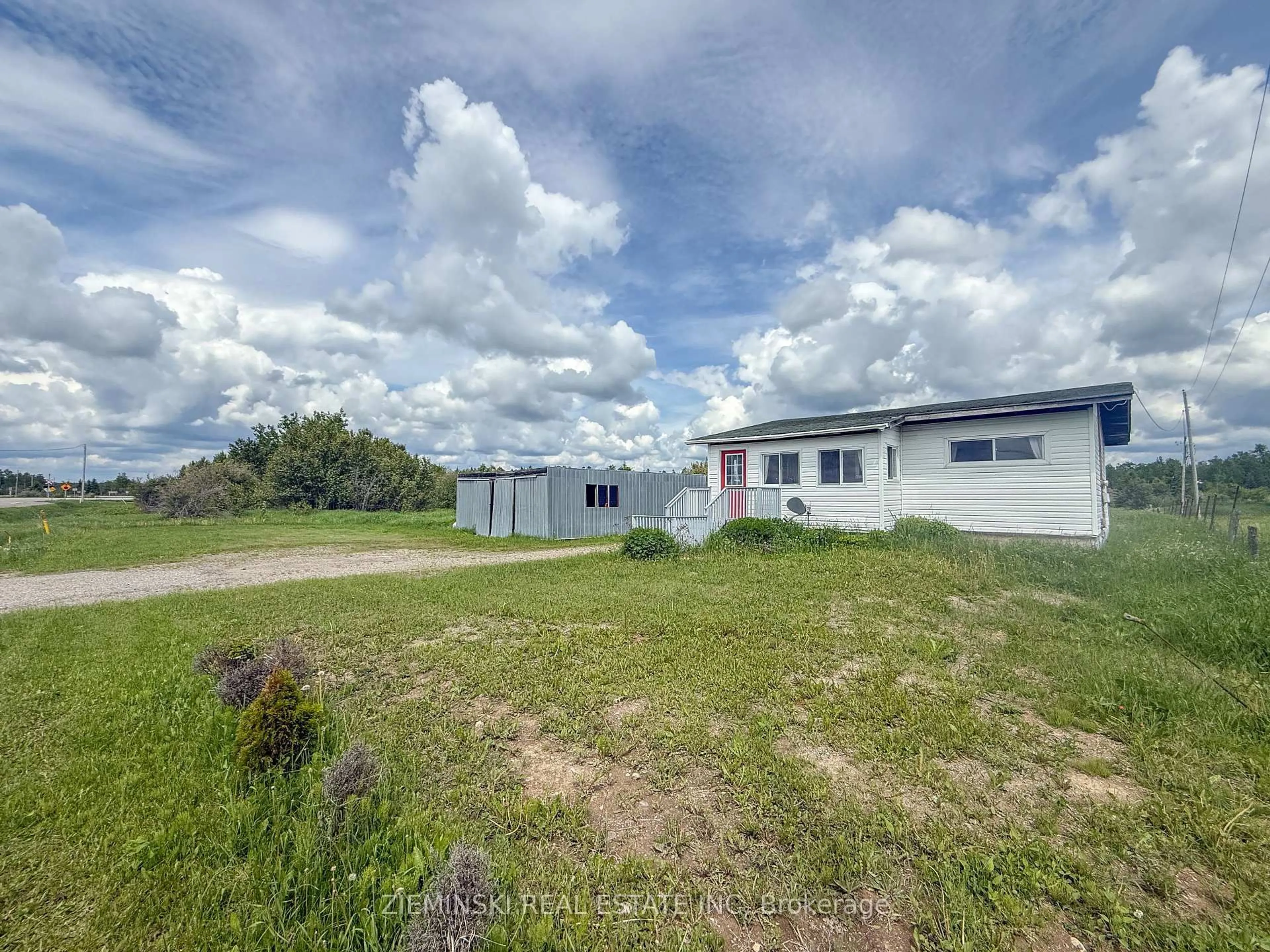 A pic from outside/outdoor area/front of a property/back of a property/a pic from drone, unknown for 3244 Hwy 67 Highway, Iroquois Falls Ontario P0N 1E0
