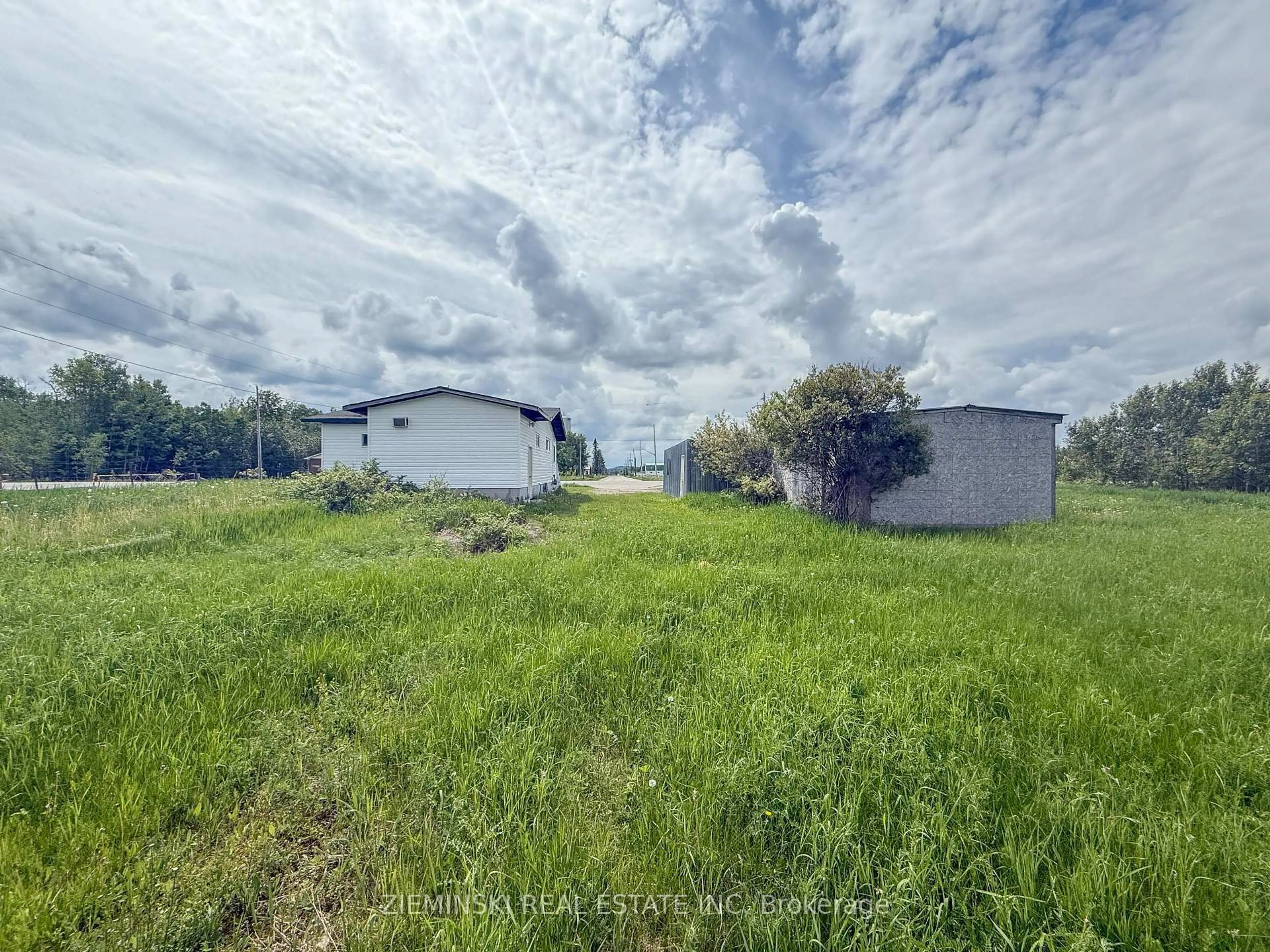 A pic from outside/outdoor area/front of a property/back of a property/a pic from drone, water/lake/river/ocean view for 3244 Hwy 67 Highway, Iroquois Falls Ontario P0N 1E0