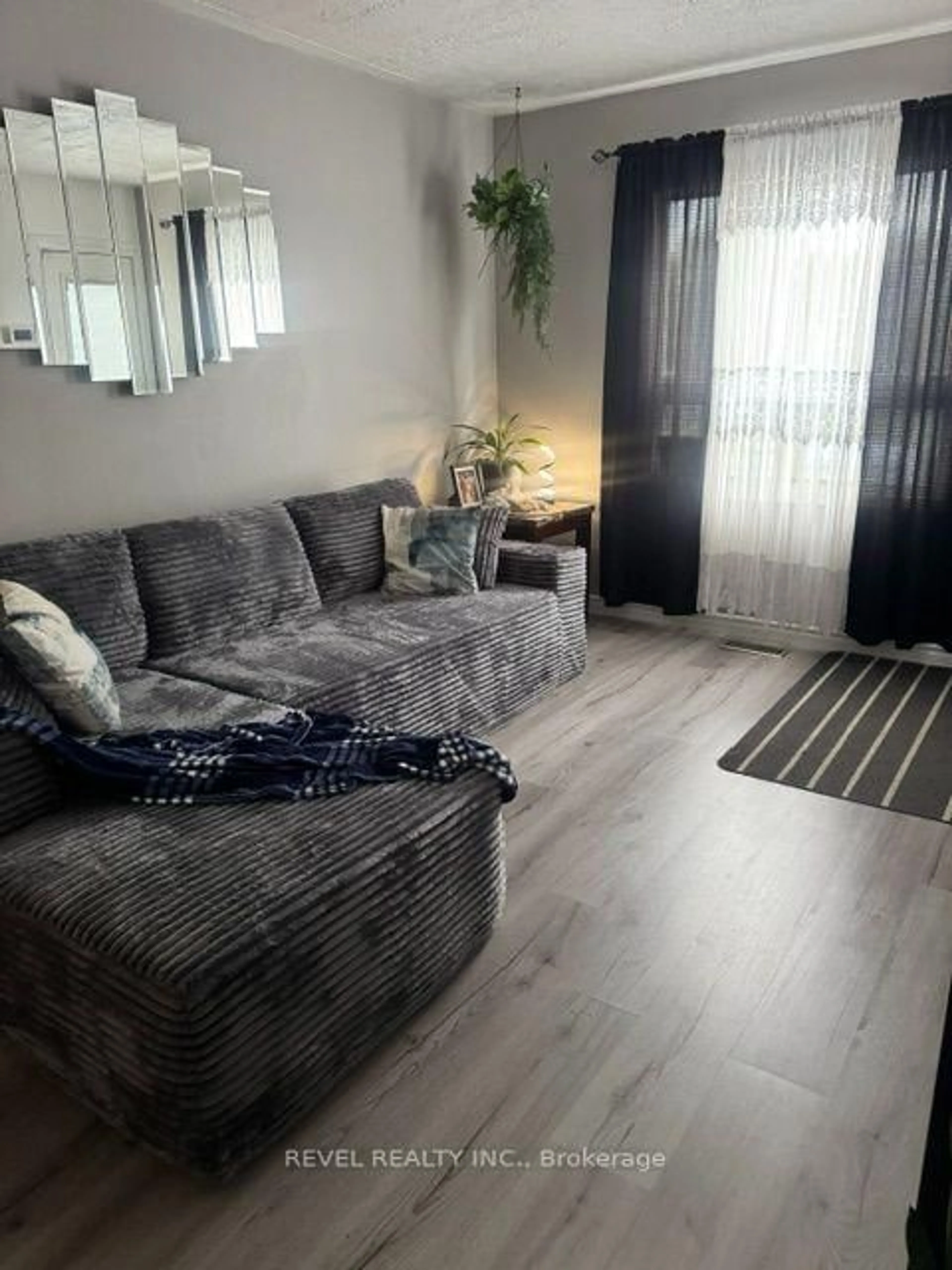 Living room with furniture, unknown for 393 Pine St, Timmins Ontario P4N 6L6