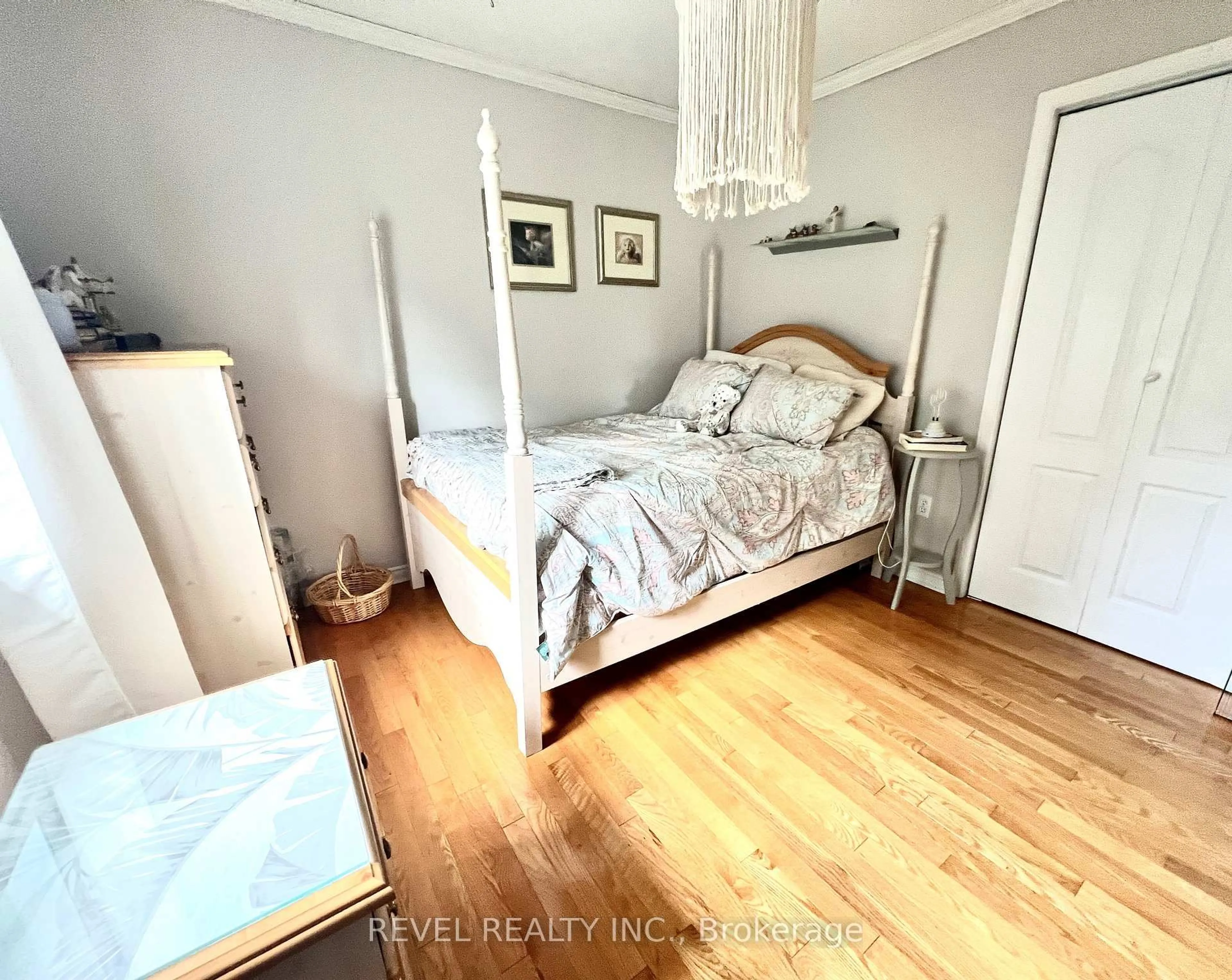 Bedroom with bed, wood/laminate floor for 206 Duke St, Timmins Ontario P0N 1C0