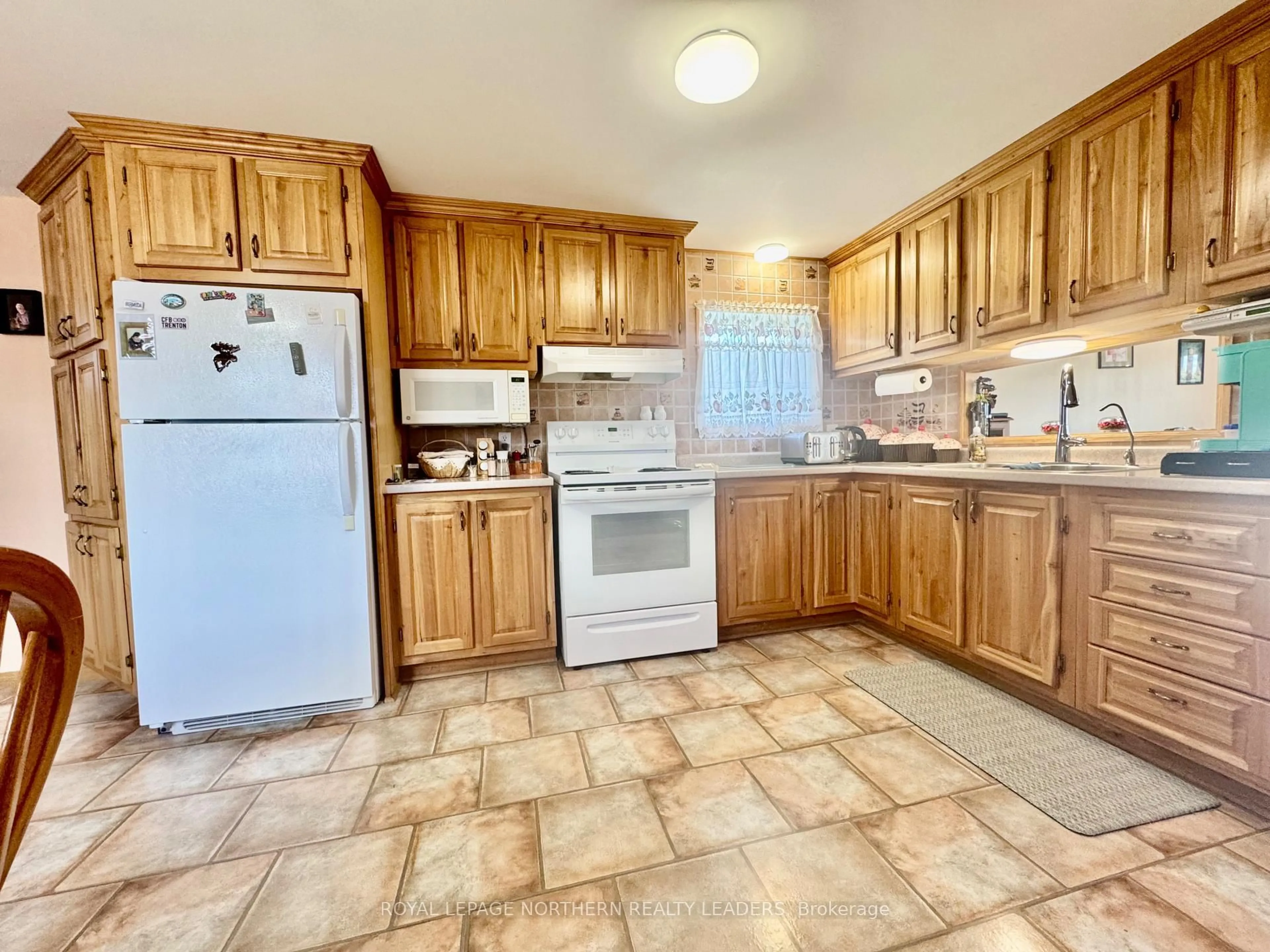Standard kitchen, ceramic/tile floor for 14 Renard Rd, Timmins Ontario P4R 0E6
