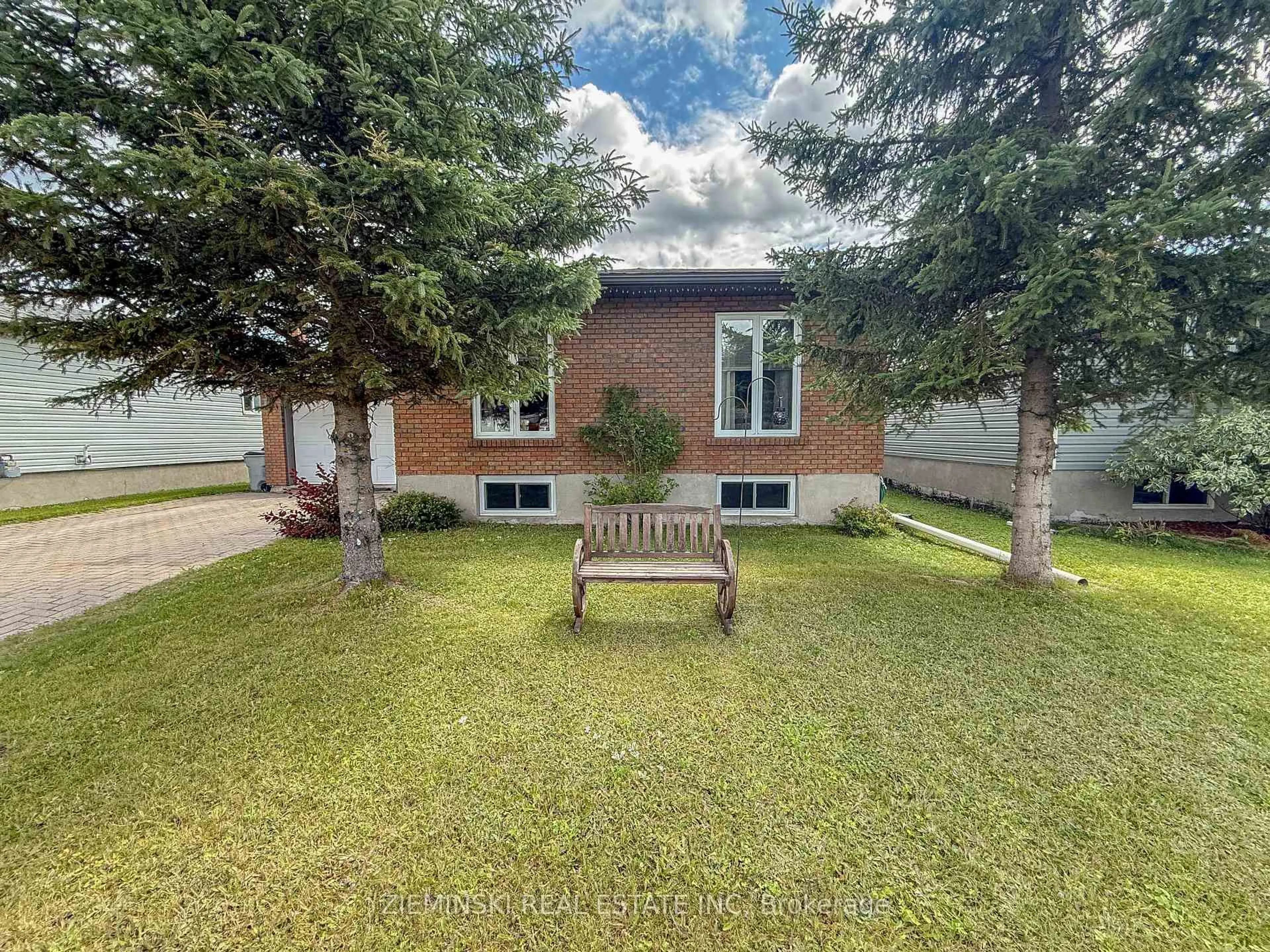 A pic from outside/outdoor area/front of a property/back of a property/a pic from drone, unknown for 605 Bristol Rd, Timmins Ontario P0N 1C0