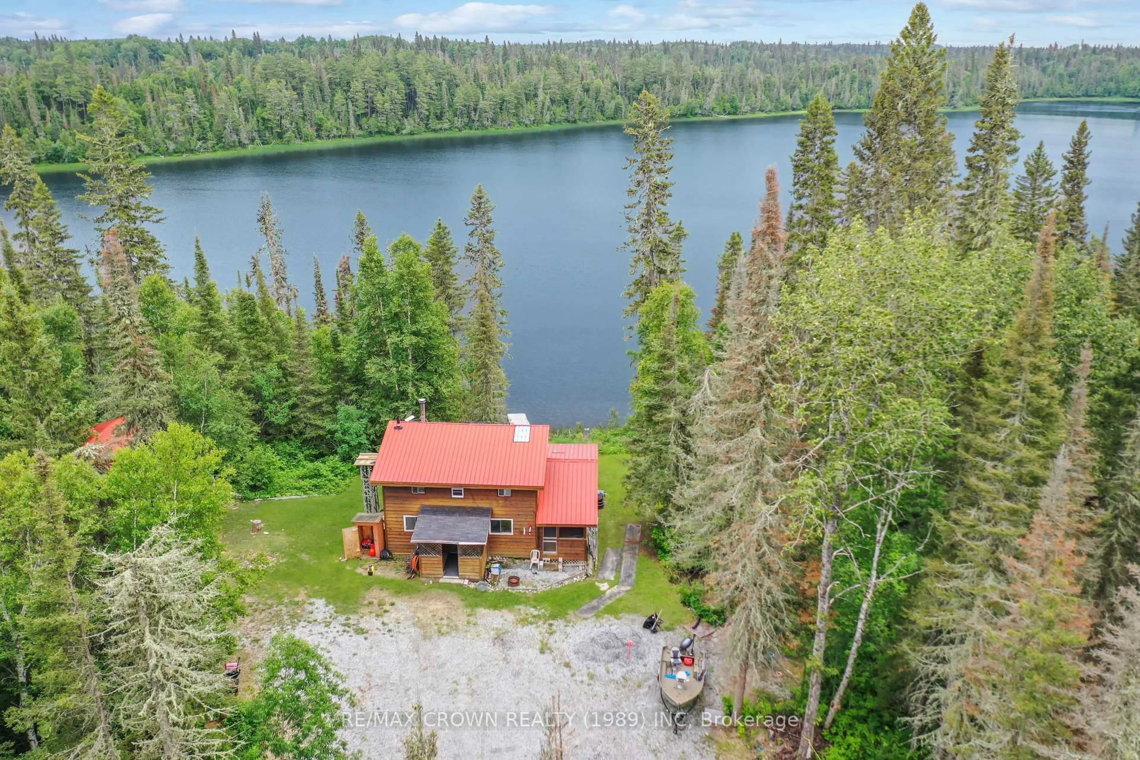 A pic from outside/outdoor area/front of a property/back of a property/a pic from drone, water/lake/river/ocean view for 6 Lot Indian Lake Rd #ALEXANDRA,, Smooth Rock Falls Ontario P0L 2B0
