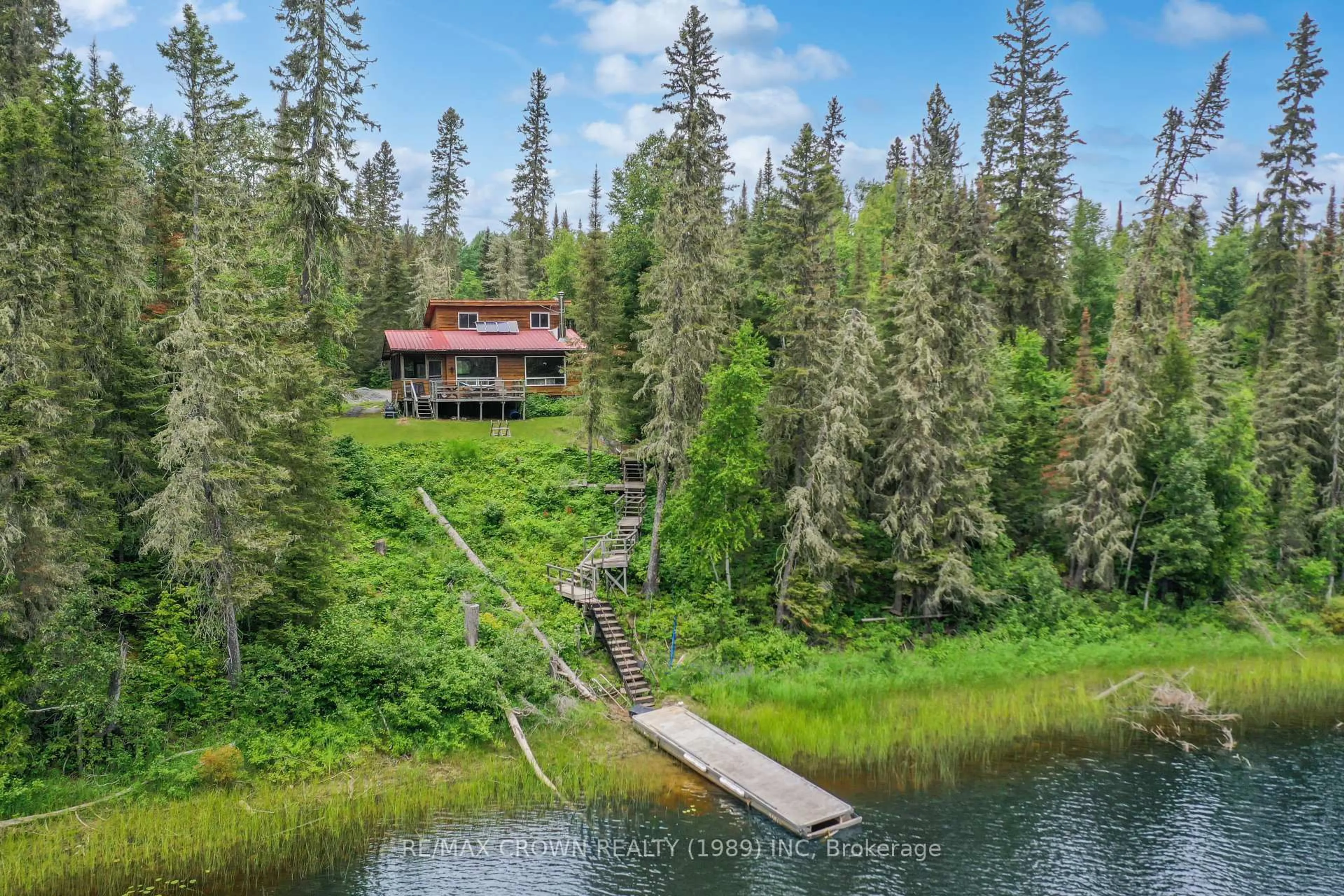 A pic from outside/outdoor area/front of a property/back of a property/a pic from drone, water/lake/river/ocean view for 6 Lot Indian Lake Rd #ALEXANDRA,, Smooth Rock Falls Ontario P0L 2B0