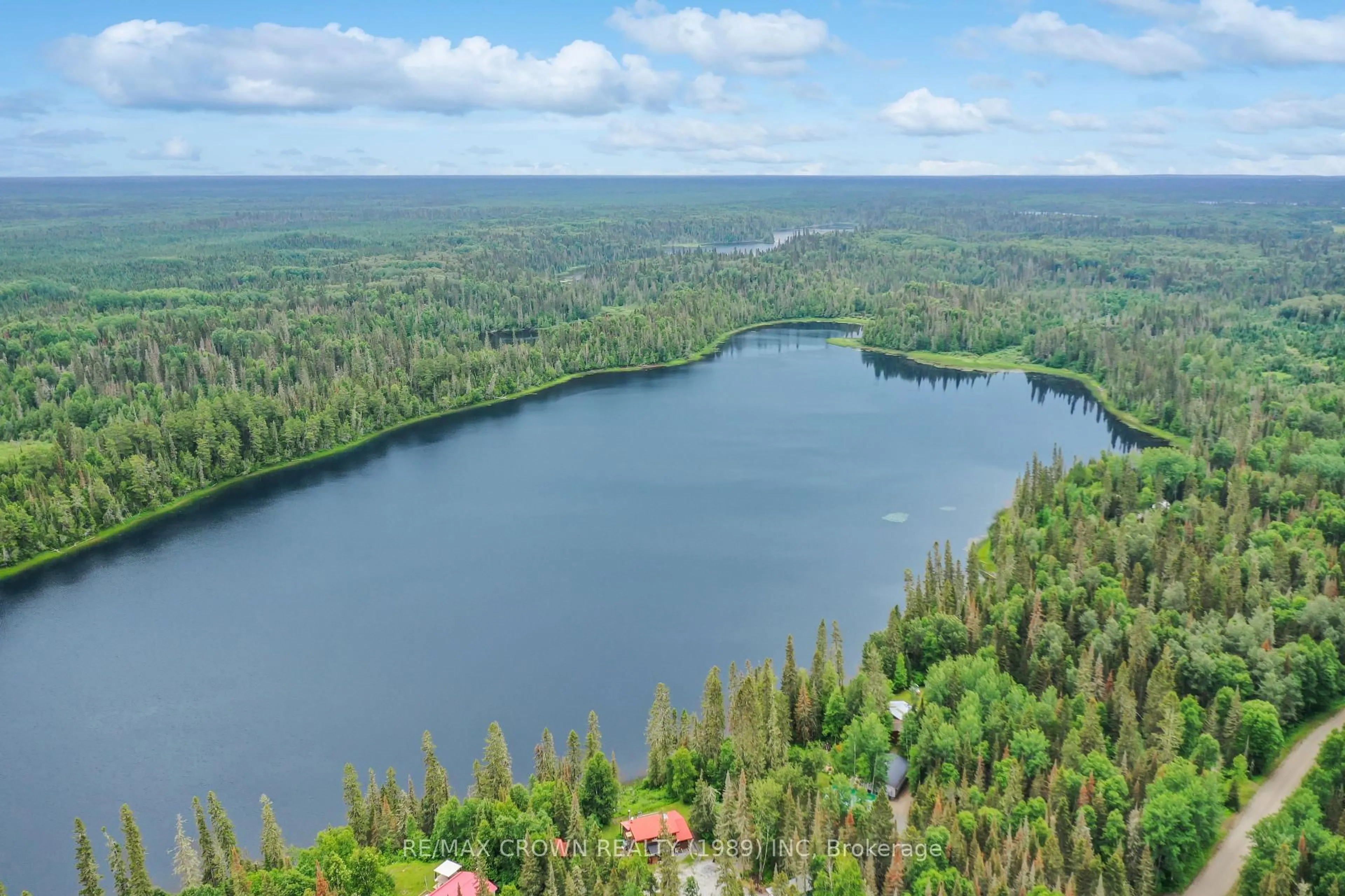 A pic from outside/outdoor area/front of a property/back of a property/a pic from drone, water/lake/river/ocean view for 6 Lot Indian Lake Rd #ALEXANDRA,, Smooth Rock Falls Ontario P0L 2B0
