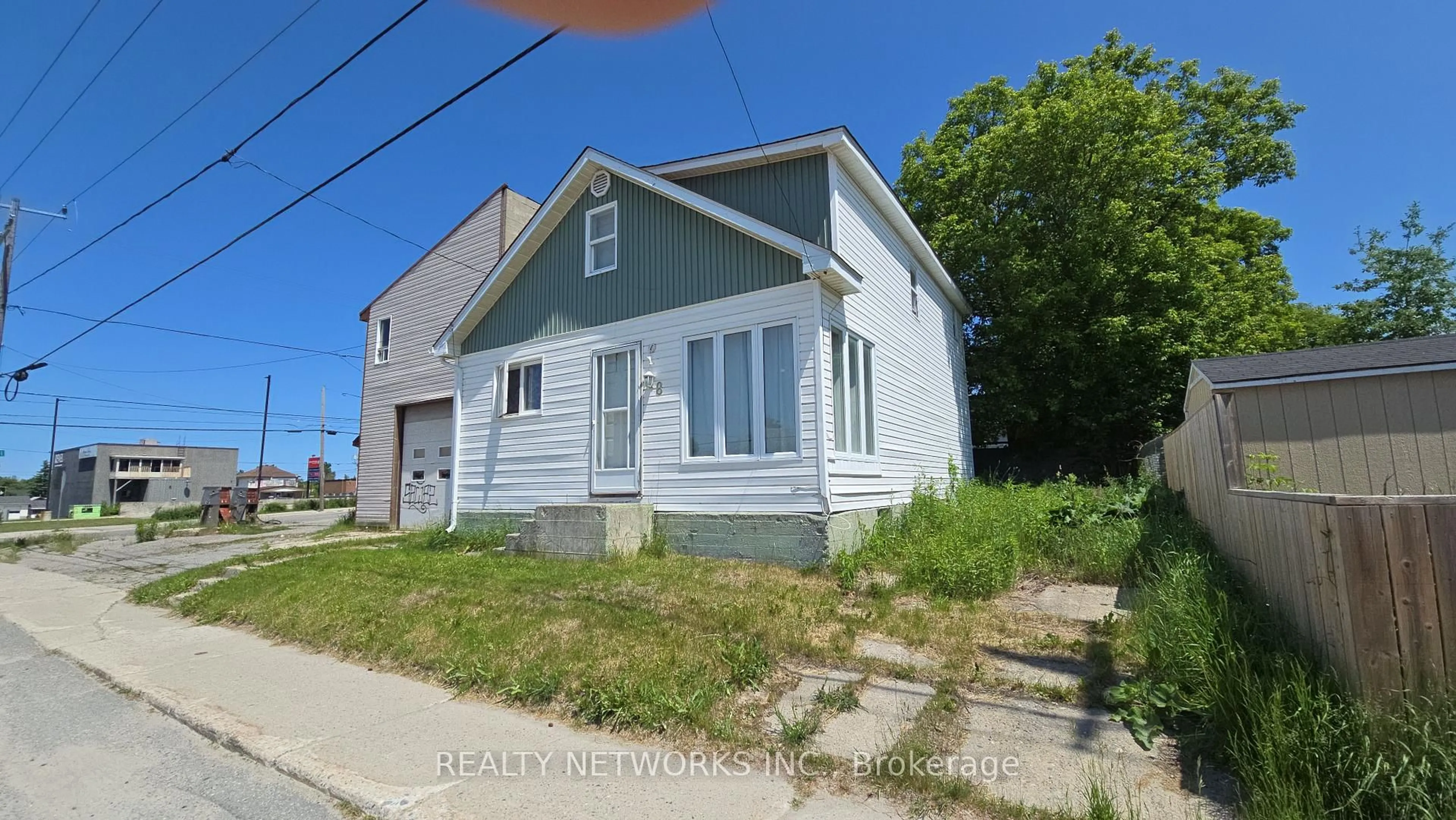 A pic from outside/outdoor area/front of a property/back of a property/a pic from drone, street for 48 Cameron St, Timmins Ontario P4N 3S6