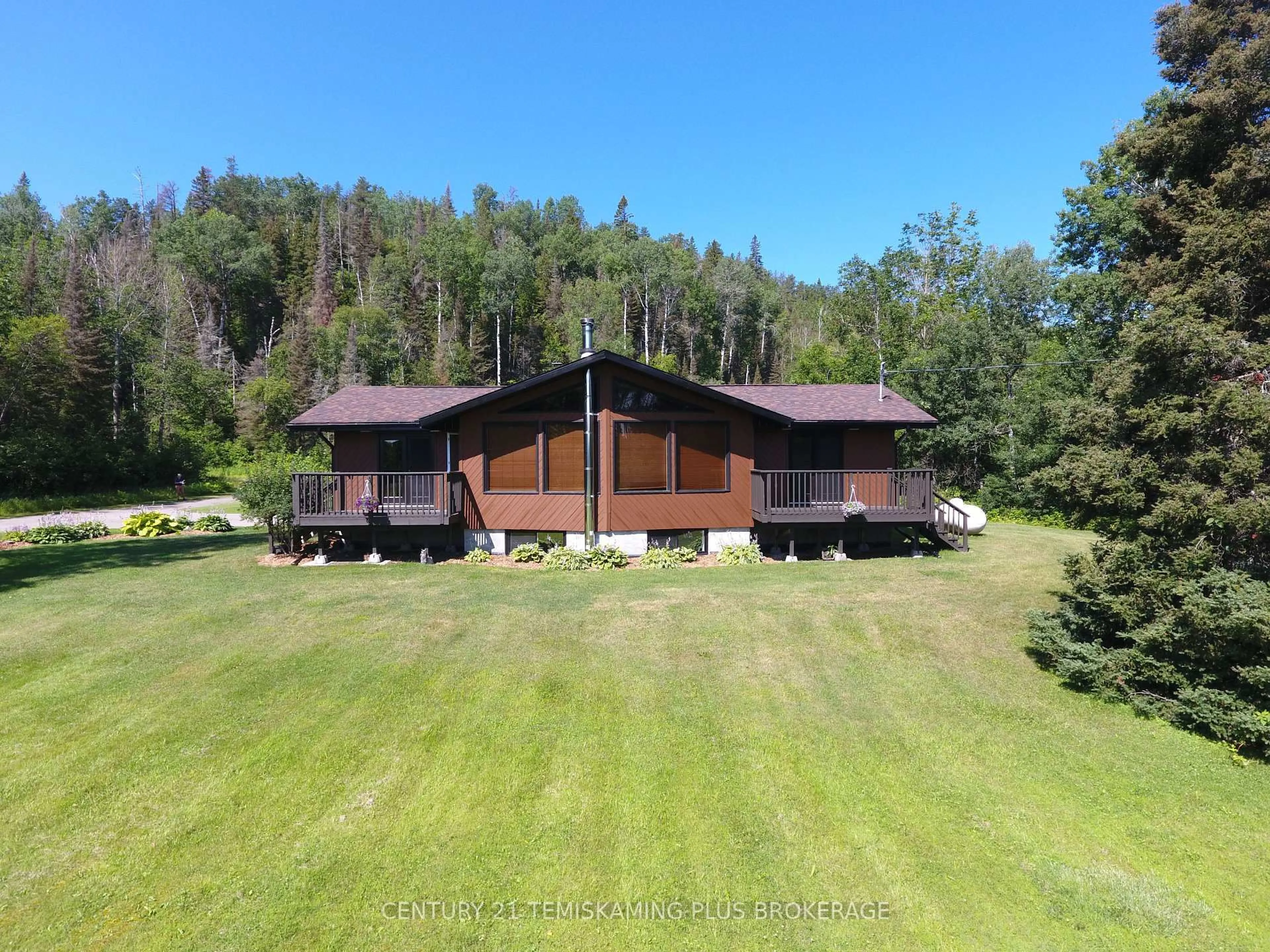 A pic from outside/outdoor area/front of a property/back of a property/a pic from drone, unknown for 805519 Hooper Rd, Timiskaming Ontario P0J 1P0