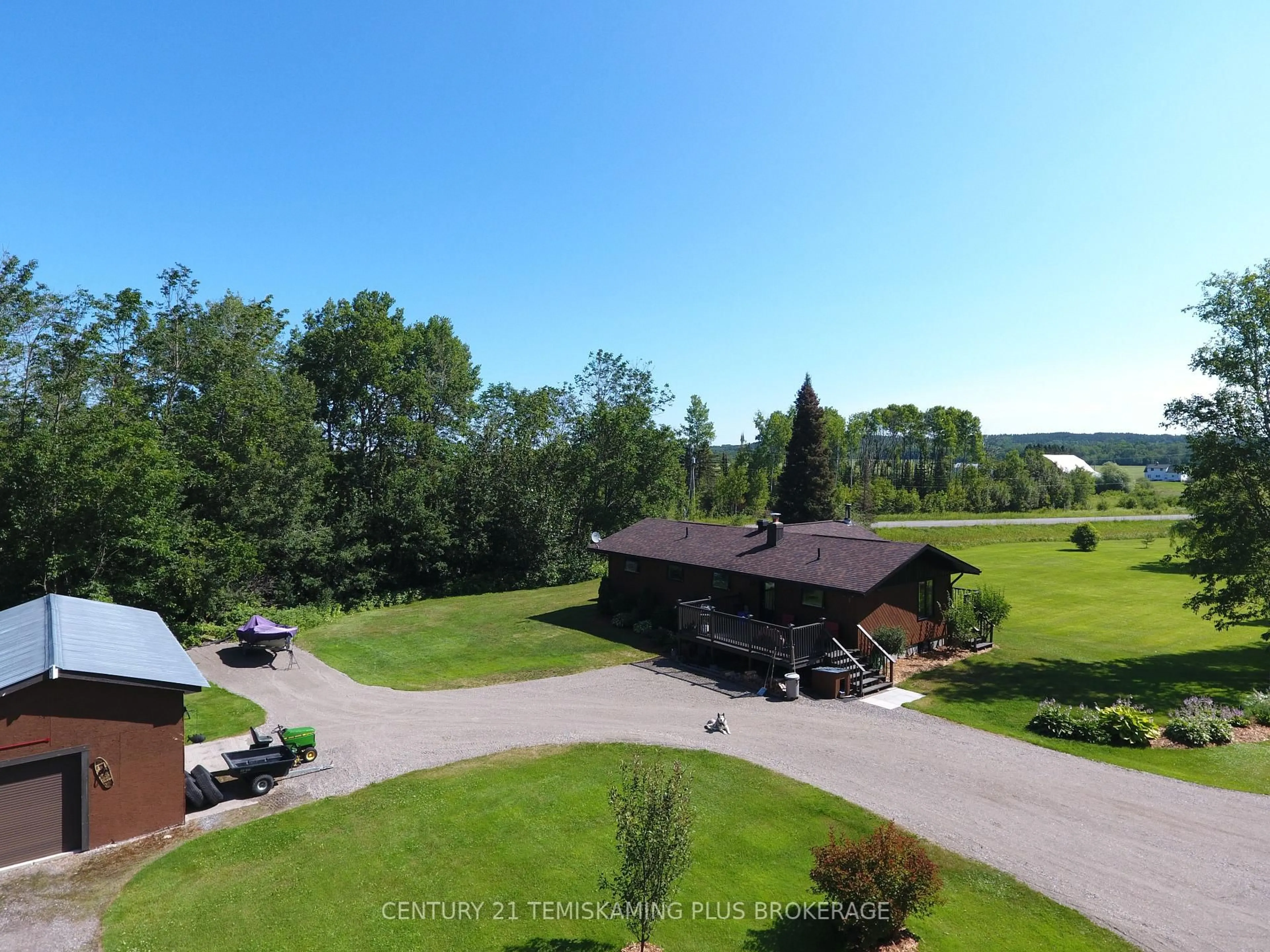 A pic from outside/outdoor area/front of a property/back of a property/a pic from drone, water/lake/river/ocean view for 805519 Hooper Rd, Timiskaming Ontario P0J 1P0