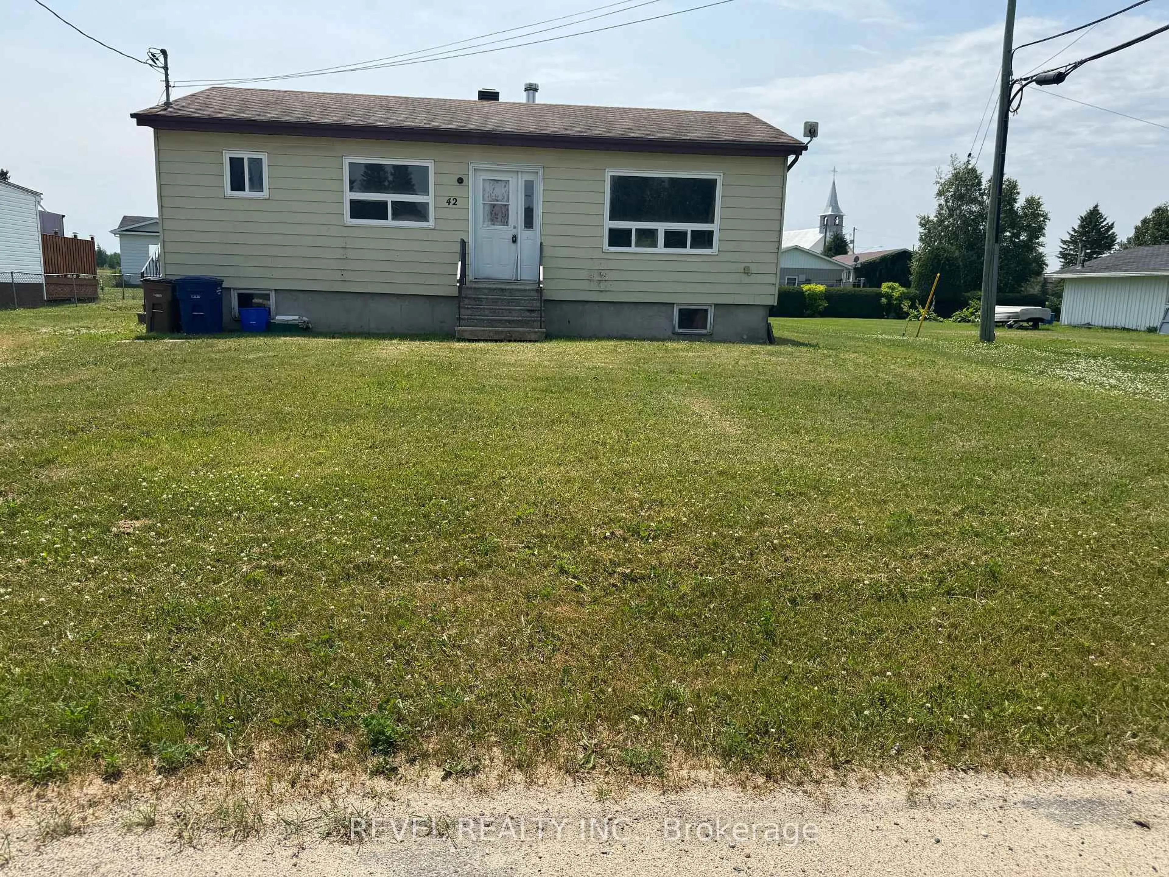 A pic from outside/outdoor area/front of a property/back of a property/a pic from drone, street for 42 Gauthier St, Kapuskasing Ontario P0L 1G0
