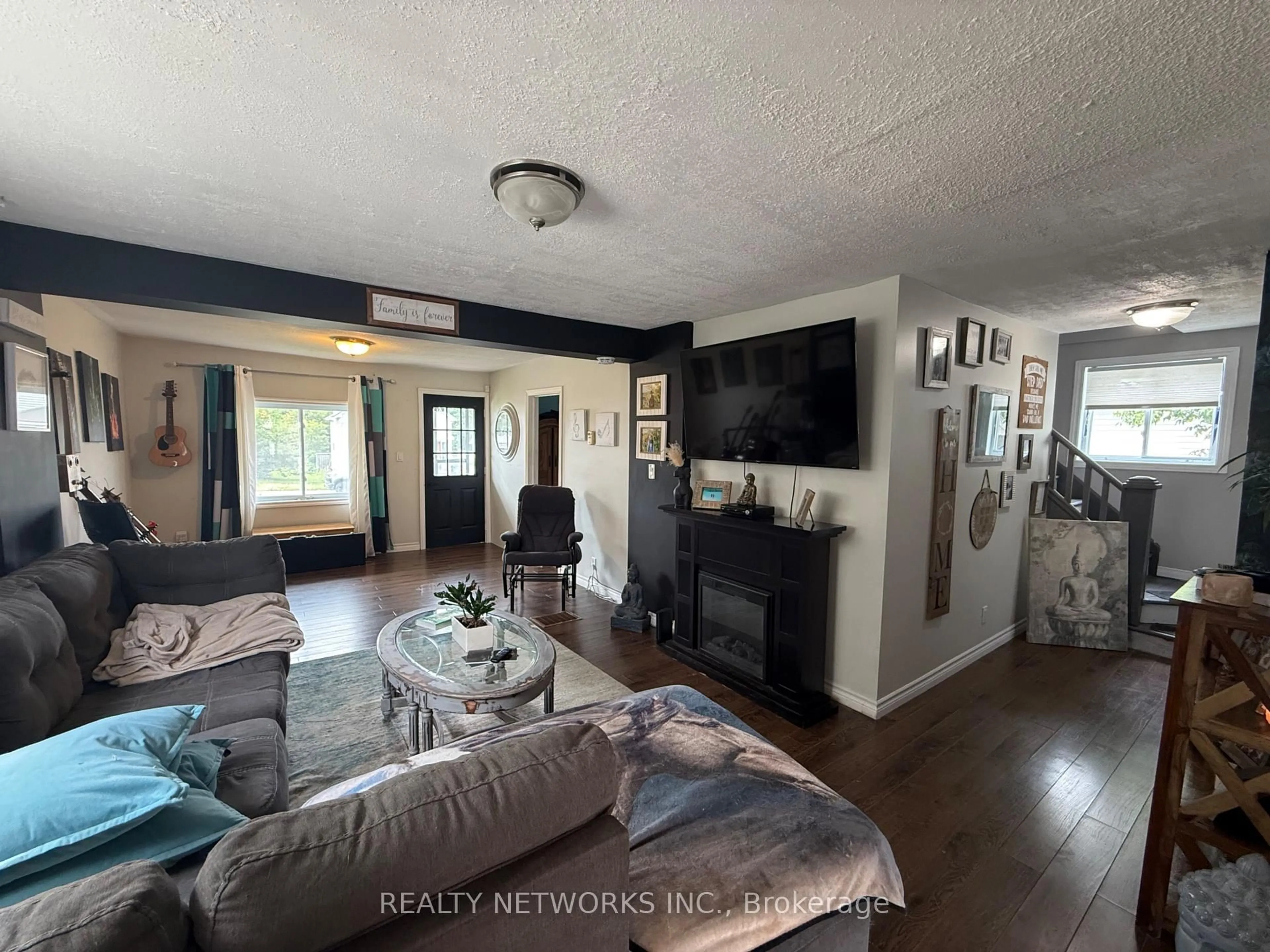 Living room with furniture, unknown for 60 O'brian Ave, Timmins Ontario P0N 1H0