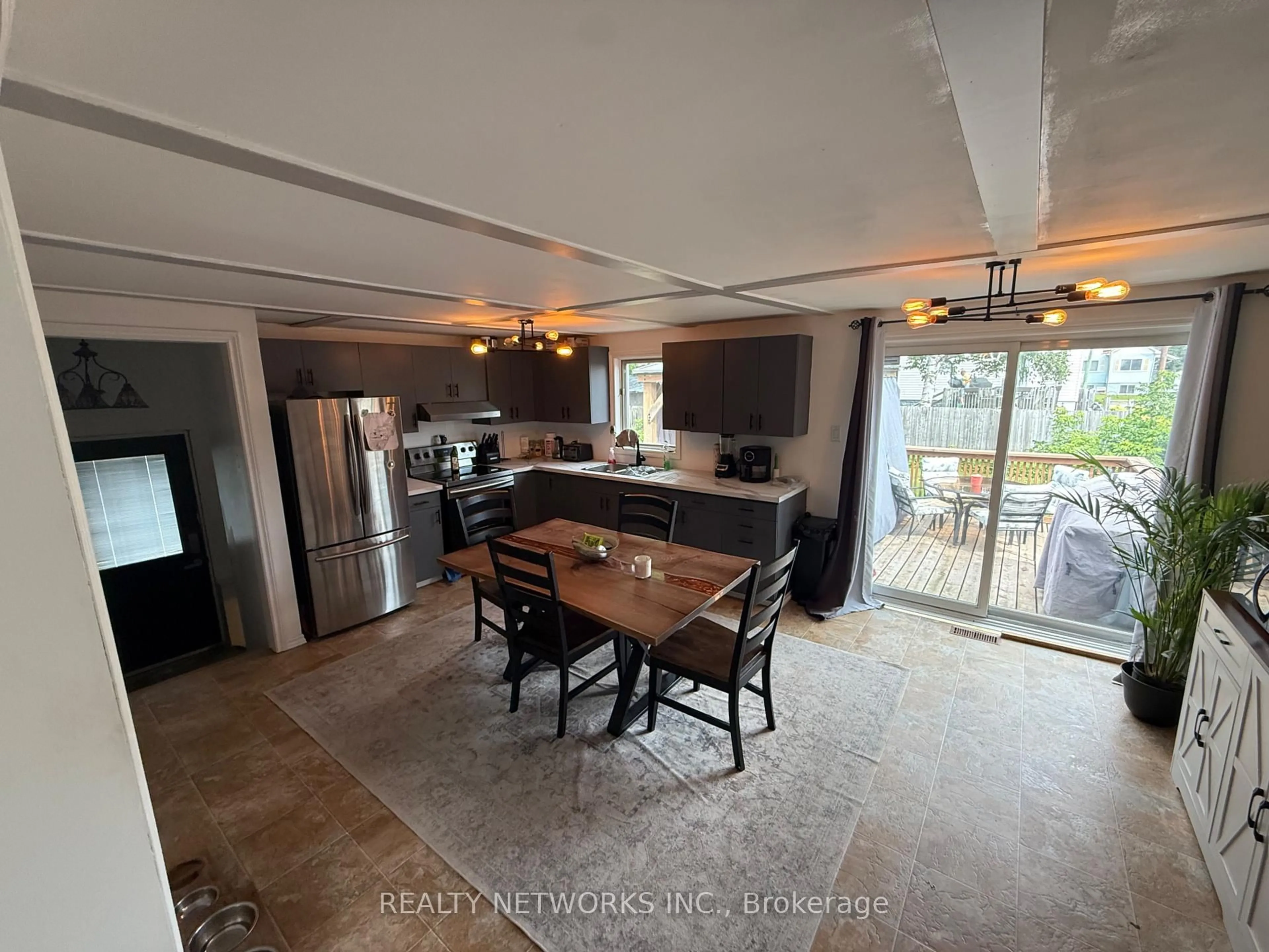 Open concept kitchen, ceramic/tile floor for 60 O'brian Ave, Timmins Ontario P0N 1H0