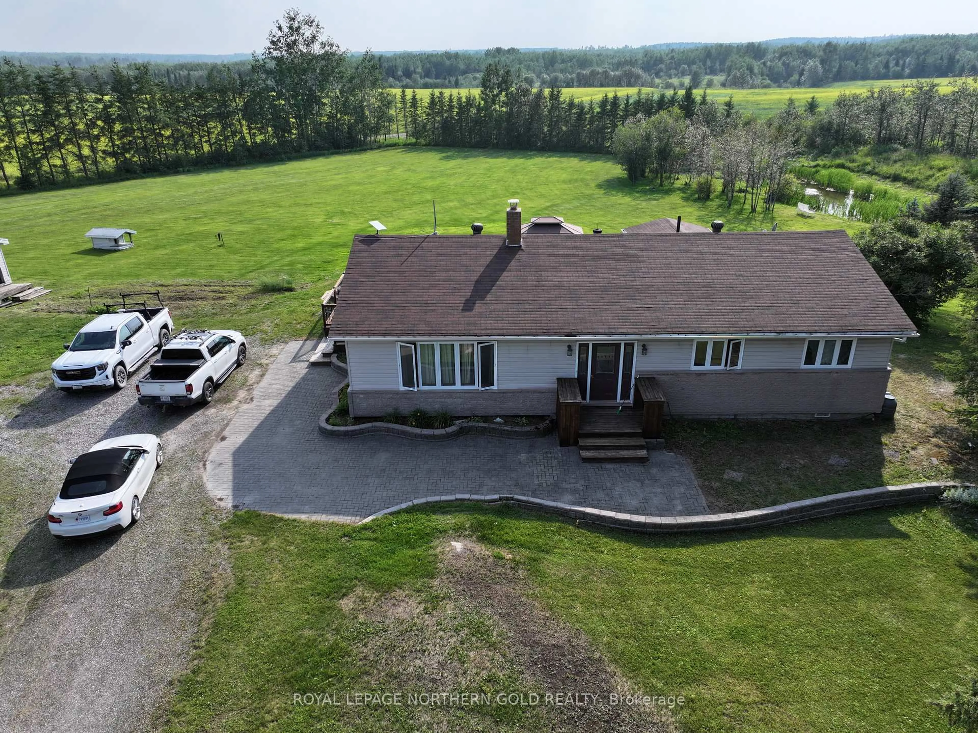 A pic from outside/outdoor area/front of a property/back of a property/a pic from drone, water/lake/river/ocean view for 6035 Highway 11 Highway, Kirkland Lake Ontario P0K 1V0