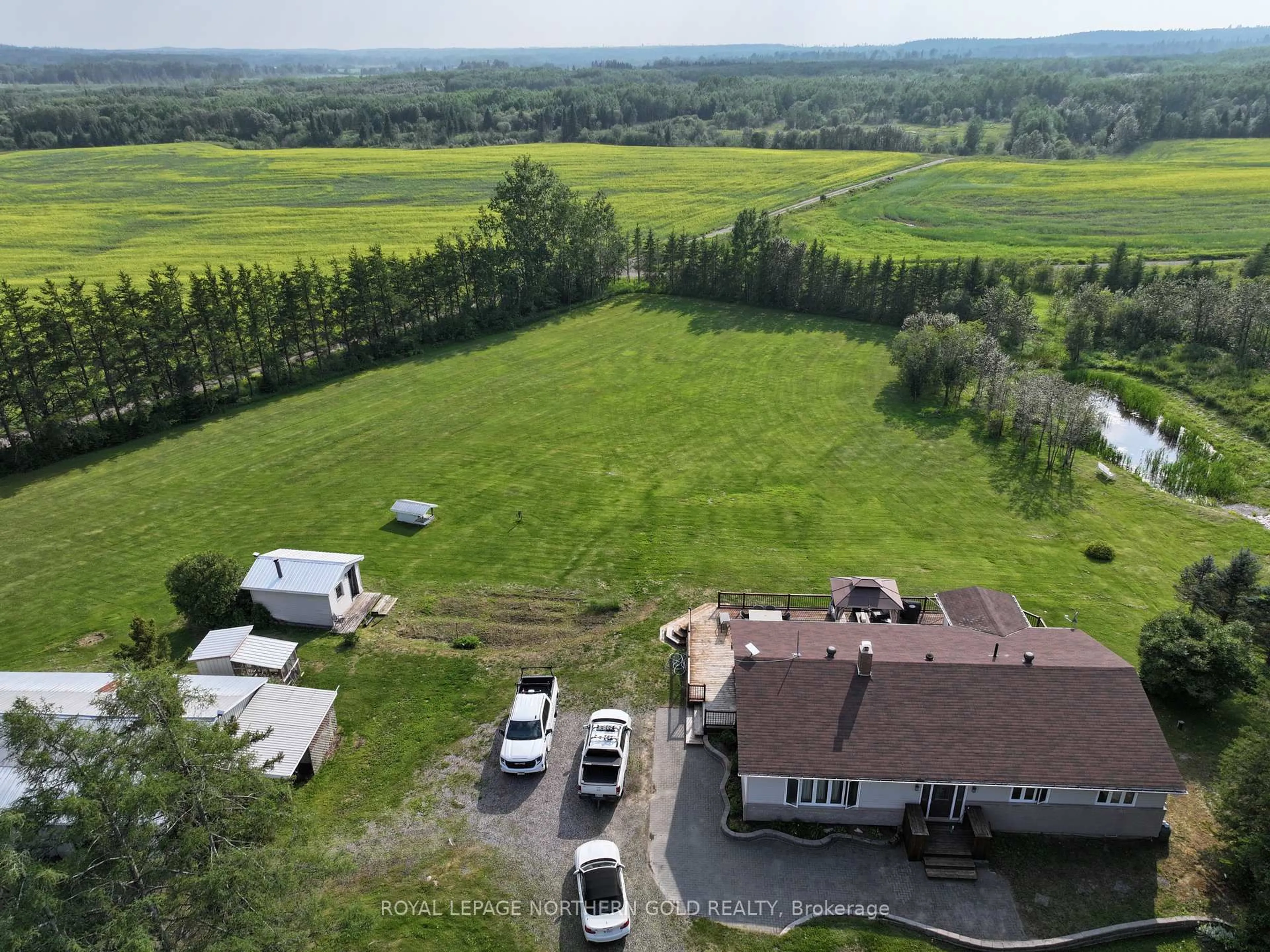 A pic from outside/outdoor area/front of a property/back of a property/a pic from drone, mountain view for 6035 Highway 11 Highway, Kirkland Lake Ontario P0K 1V0