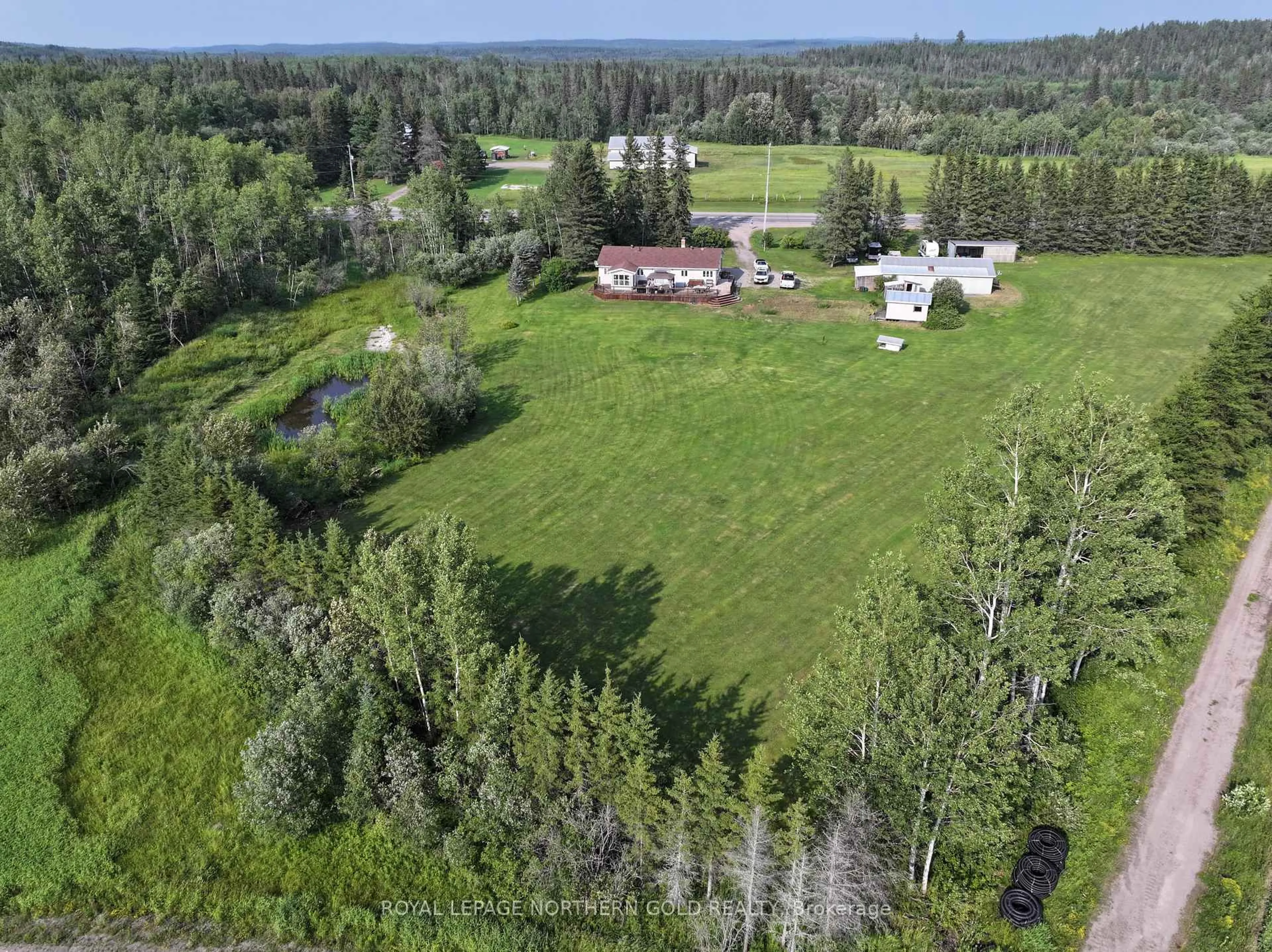 A pic from outside/outdoor area/front of a property/back of a property/a pic from drone, forest/trees view for 6035 Highway 11 Highway, Kirkland Lake Ontario P0K 1V0
