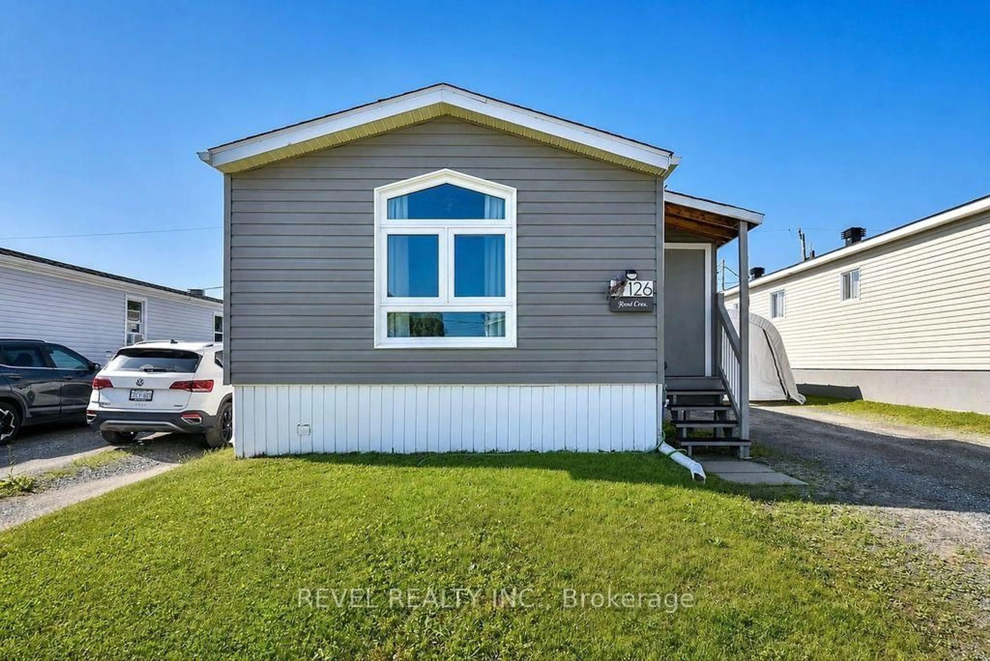Home with vinyl exterior material, street for 126 Remi Cres, Timmins Ontario P4N 0C4