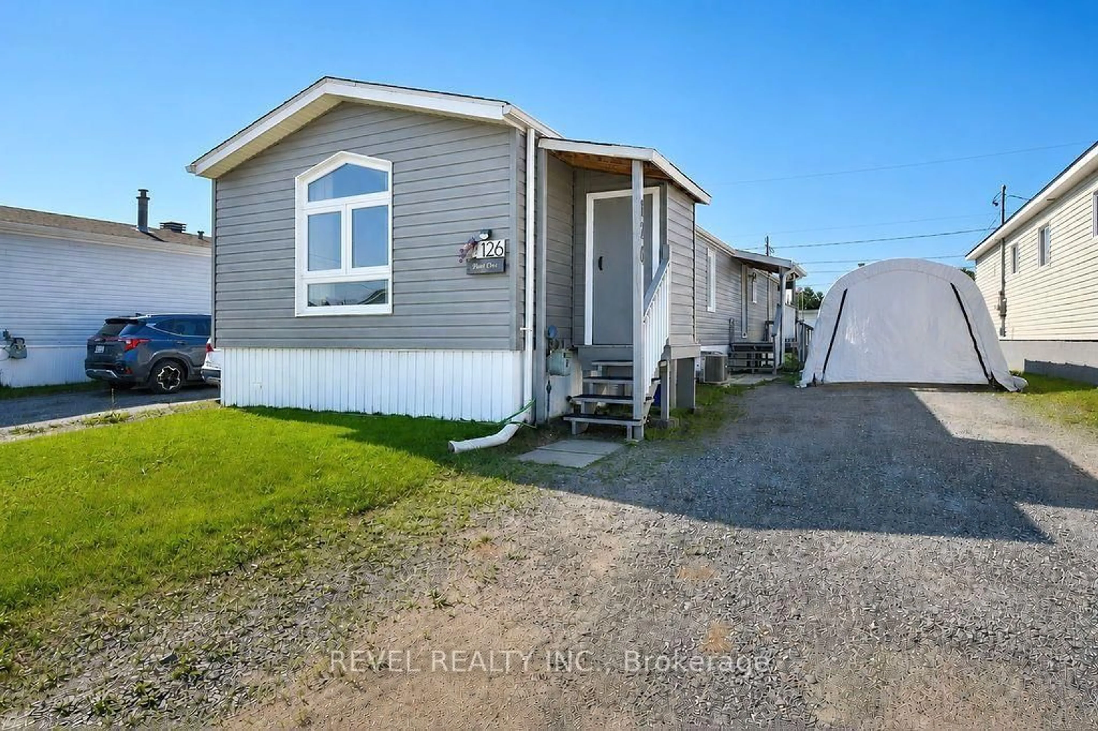 Home with vinyl exterior material, street for 126 Remi Cres, Timmins Ontario P4N 0C4