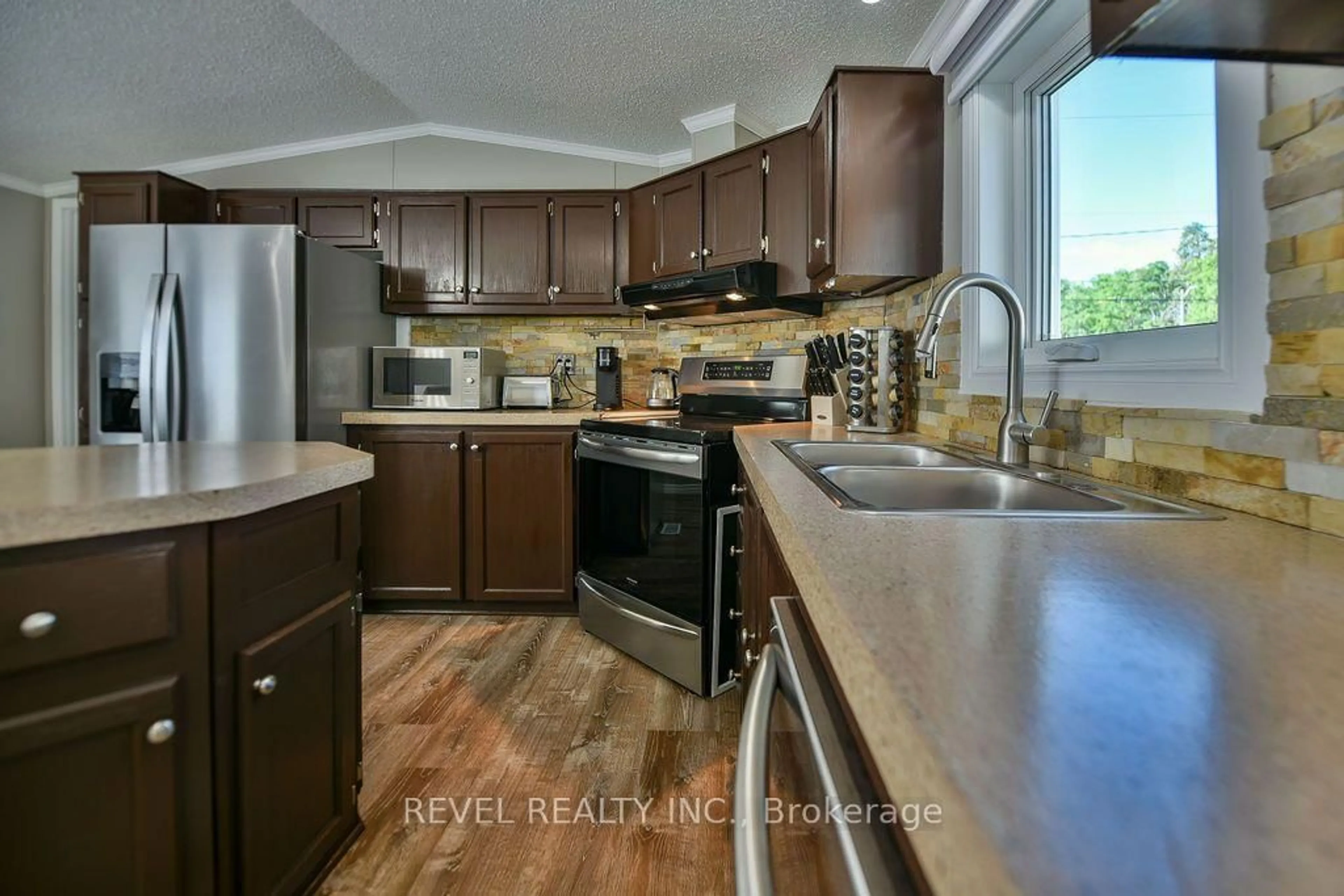 Open concept kitchen, unknown for 126 Remi Cres, Timmins Ontario P4N 0C4