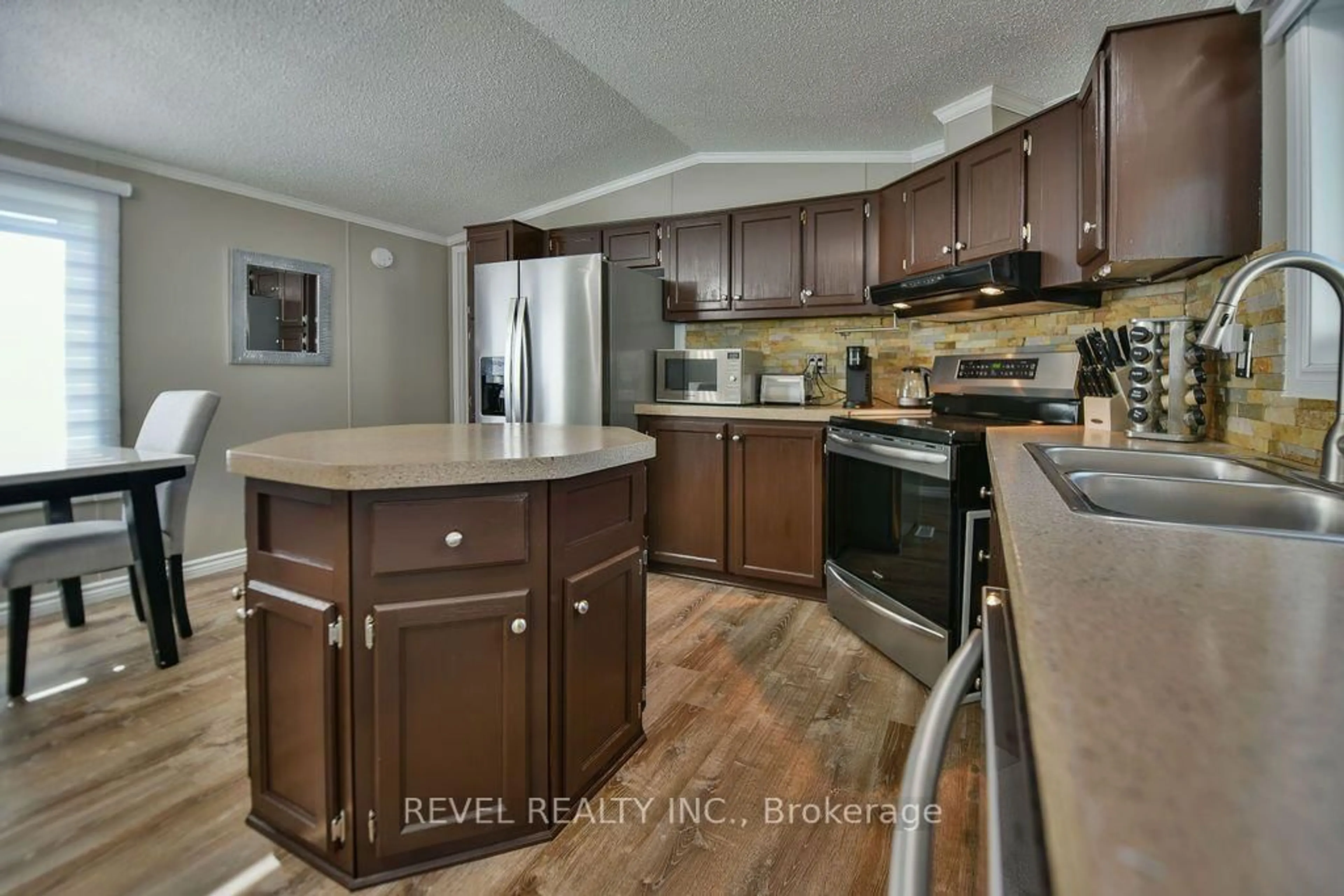 Open concept kitchen, unknown for 126 Remi Cres, Timmins Ontario P4N 0C4