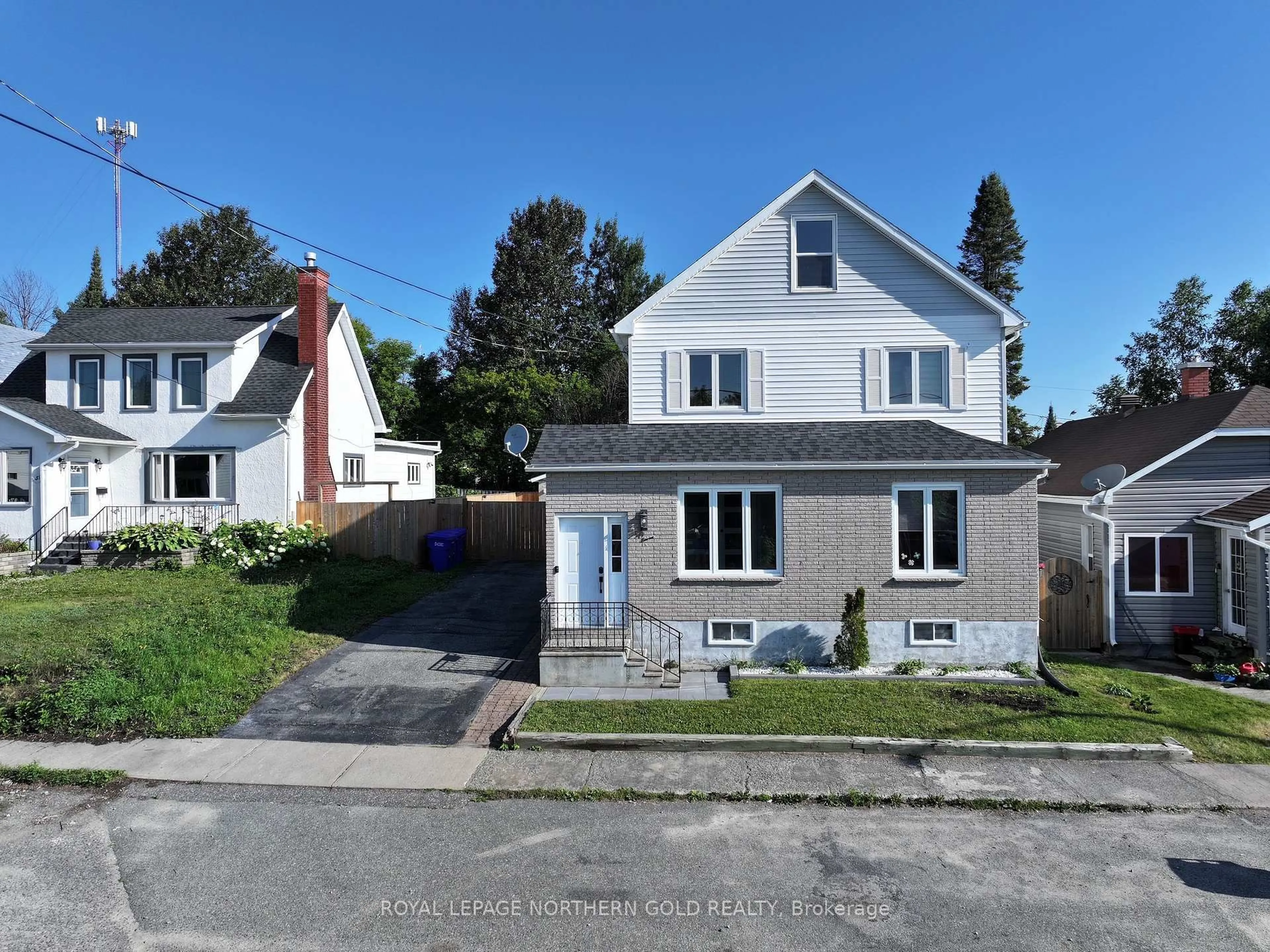 A pic from outside/outdoor area/front of a property/back of a property/a pic from drone, street for 57 MCCAMUS Ave, Kirkland Lake Ontario P2N 2J8