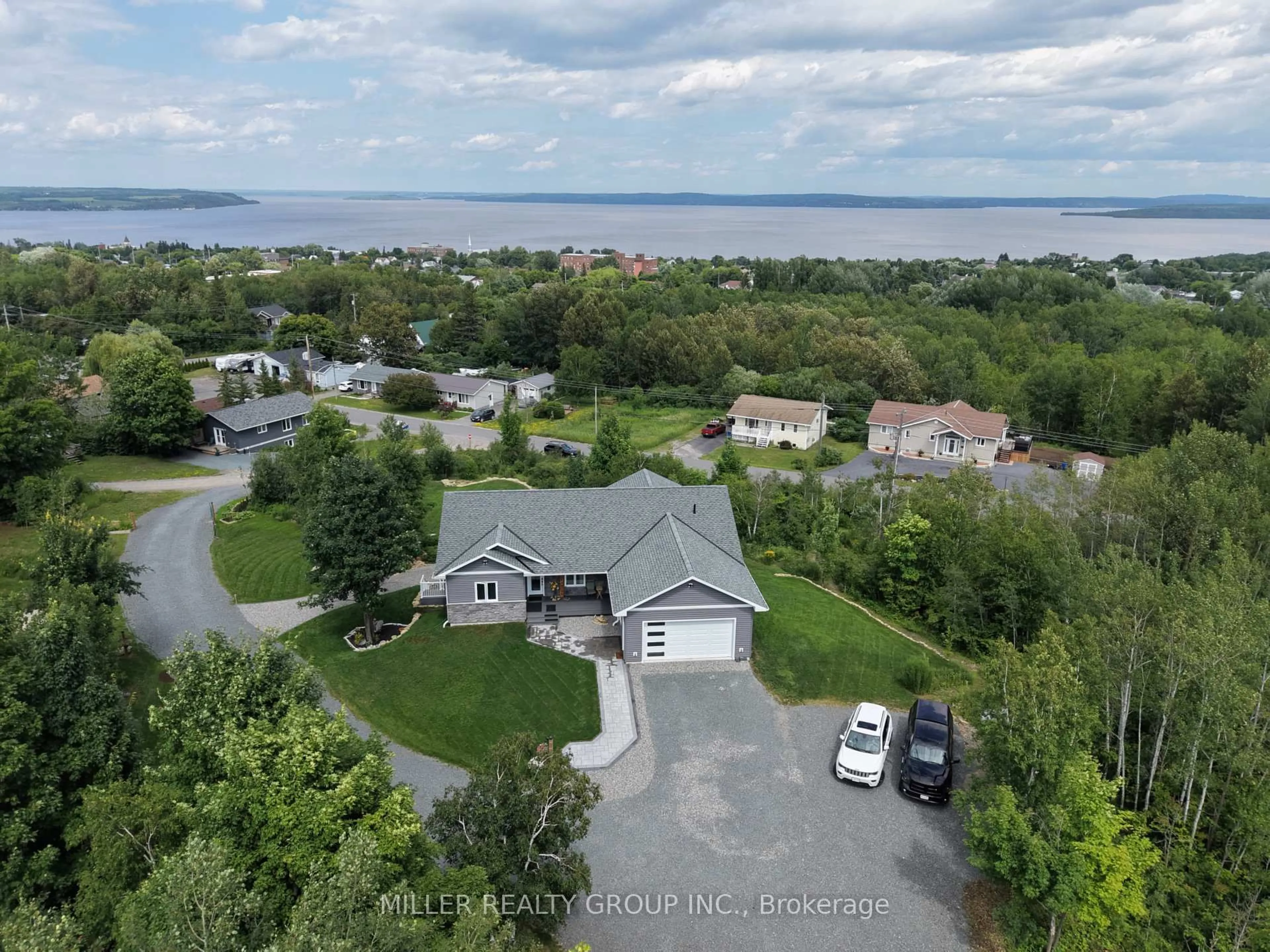 A pic from outside/outdoor area/front of a property/back of a property/a pic from drone, water/lake/river/ocean view for 160 Niven St, Temiskaming Shores Ontario P0J 1K0