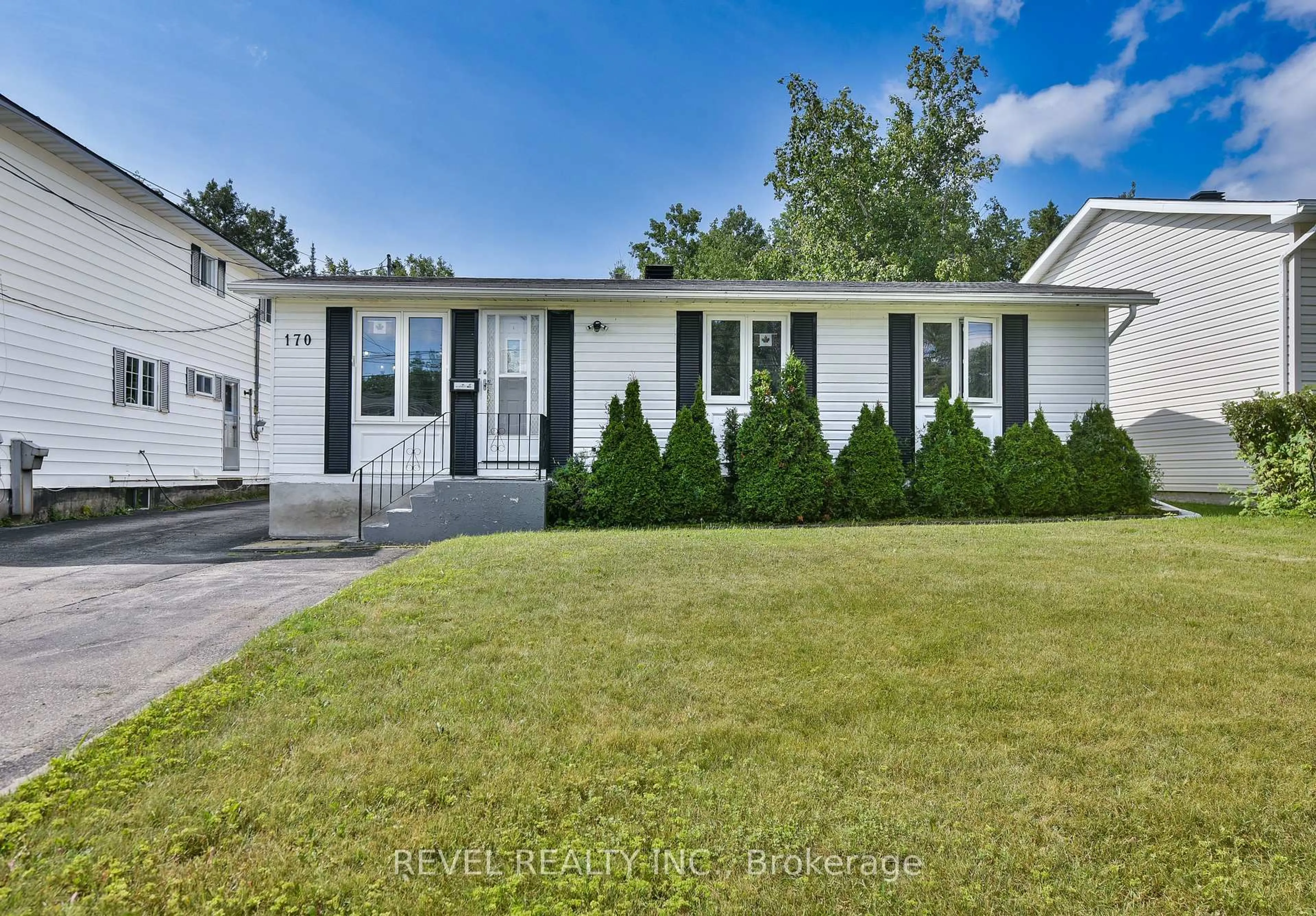 Home with vinyl exterior material, street for 170 Fourth Ave, Timmins Ontario P0N 1G0