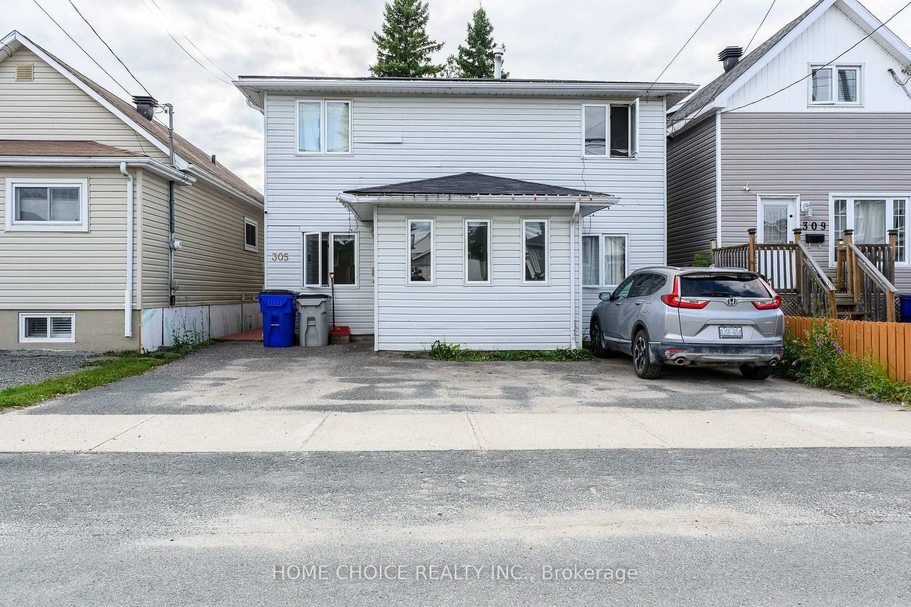 A pic from outside/outdoor area/front of a property/back of a property/a pic from drone, street for 305 Maple St, Timmins Ontario P4N 6C2