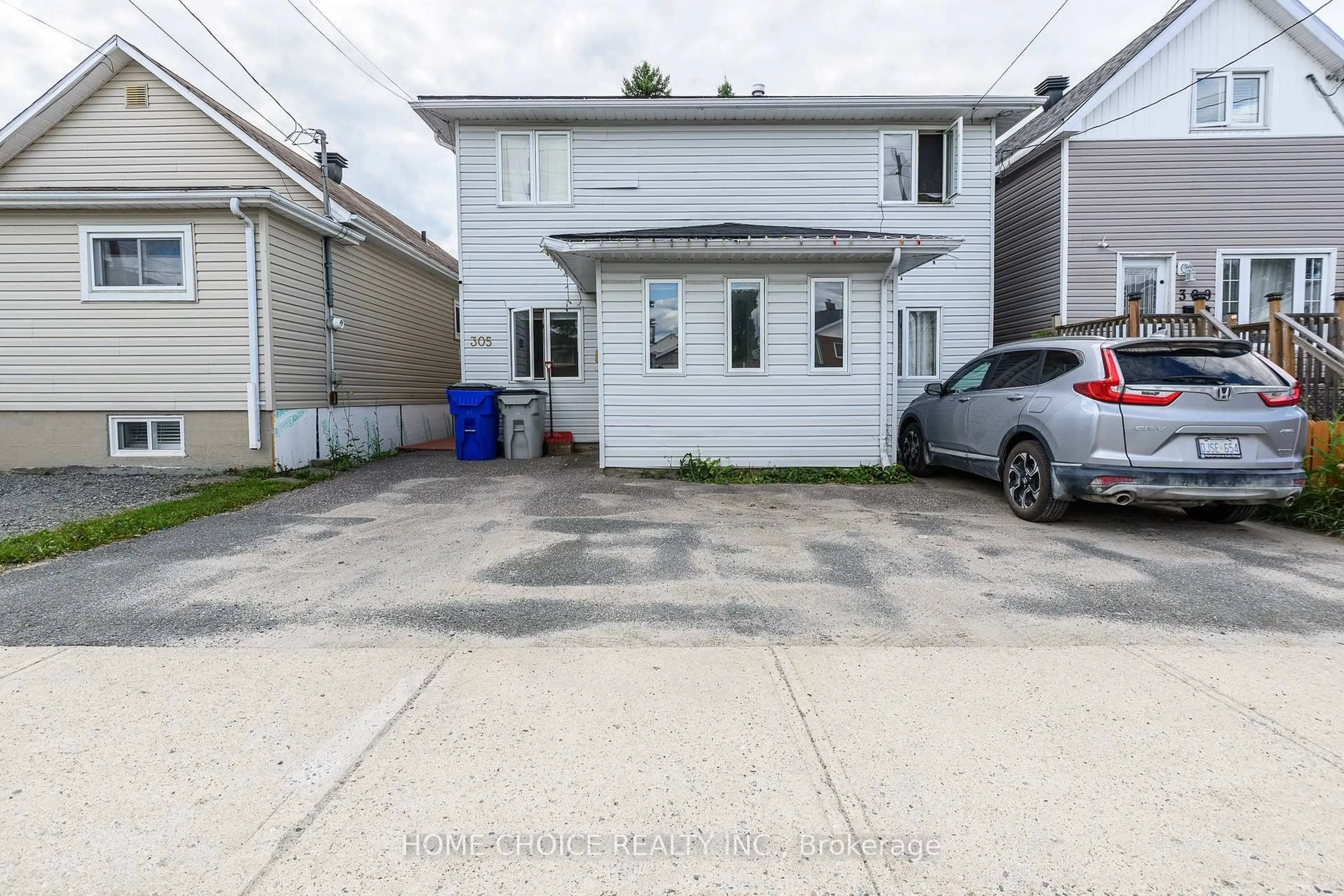 A pic from outside/outdoor area/front of a property/back of a property/a pic from drone, street for 305 Maple St, Timmins Ontario P4N 6C2