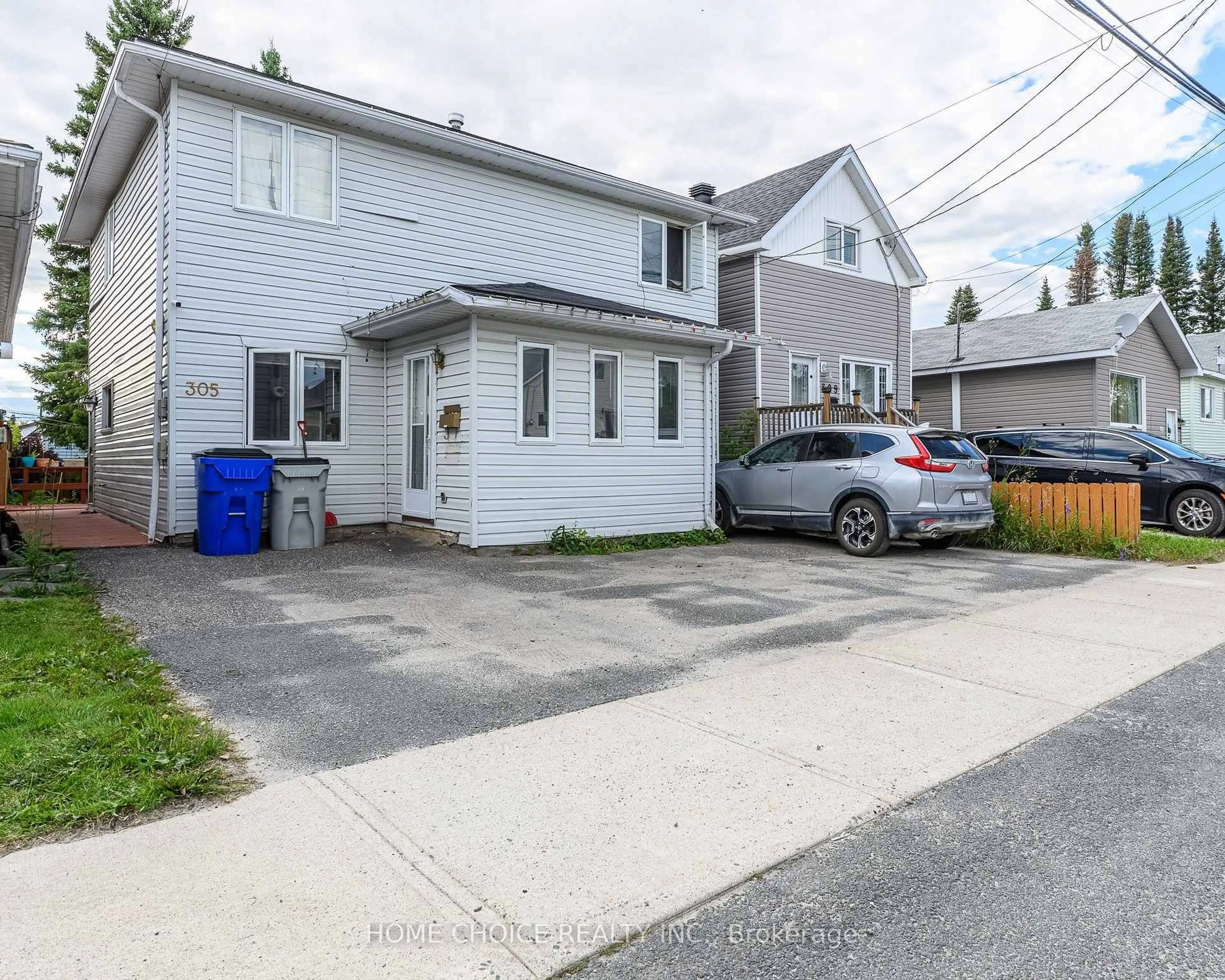 A pic from outside/outdoor area/front of a property/back of a property/a pic from drone, street for 305 Maple St, Timmins Ontario P4N 6C2
