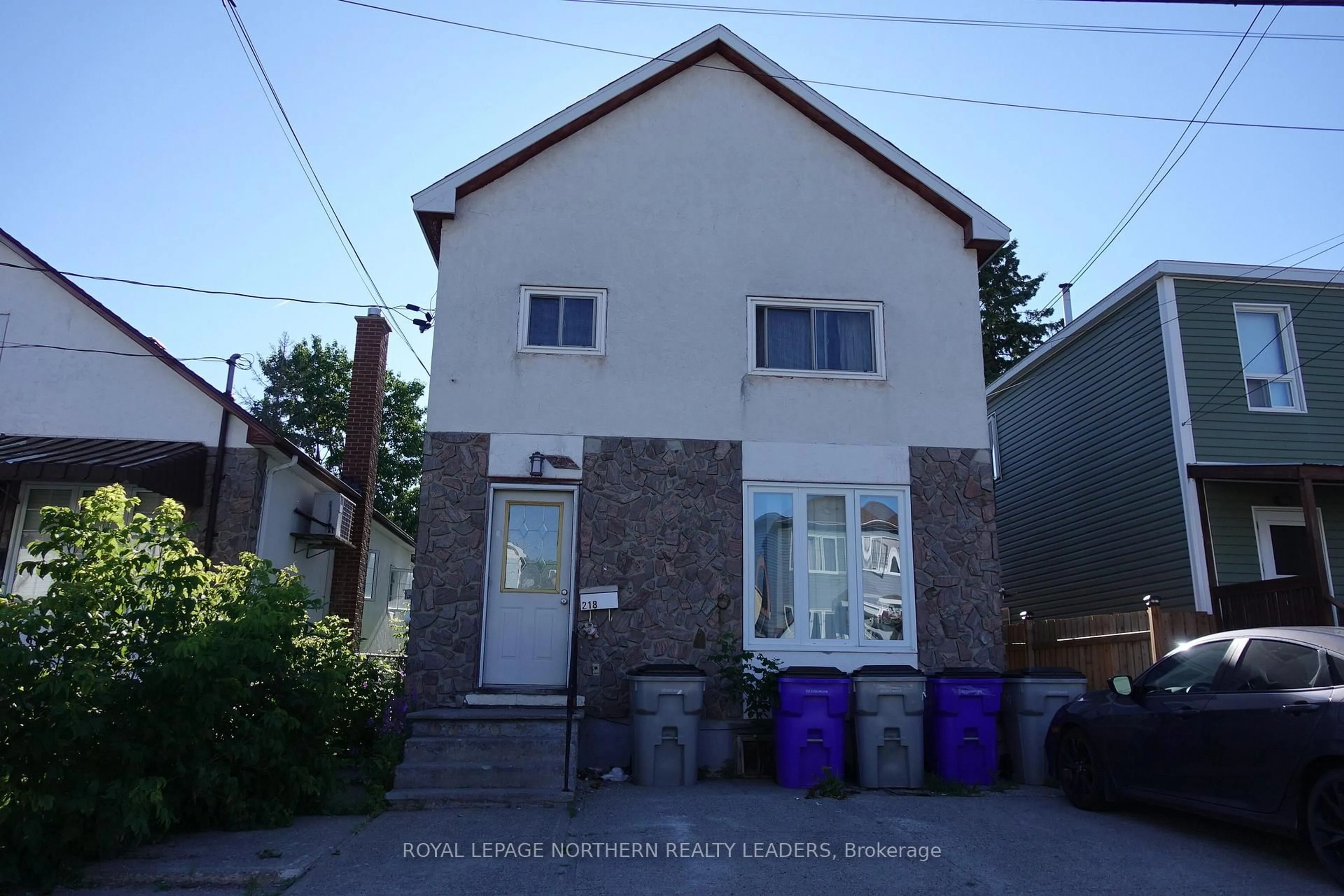 A pic from outside/outdoor area/front of a property/back of a property/a pic from drone, street for 218 Elm St, Timmins Ontario P4N 1X1
