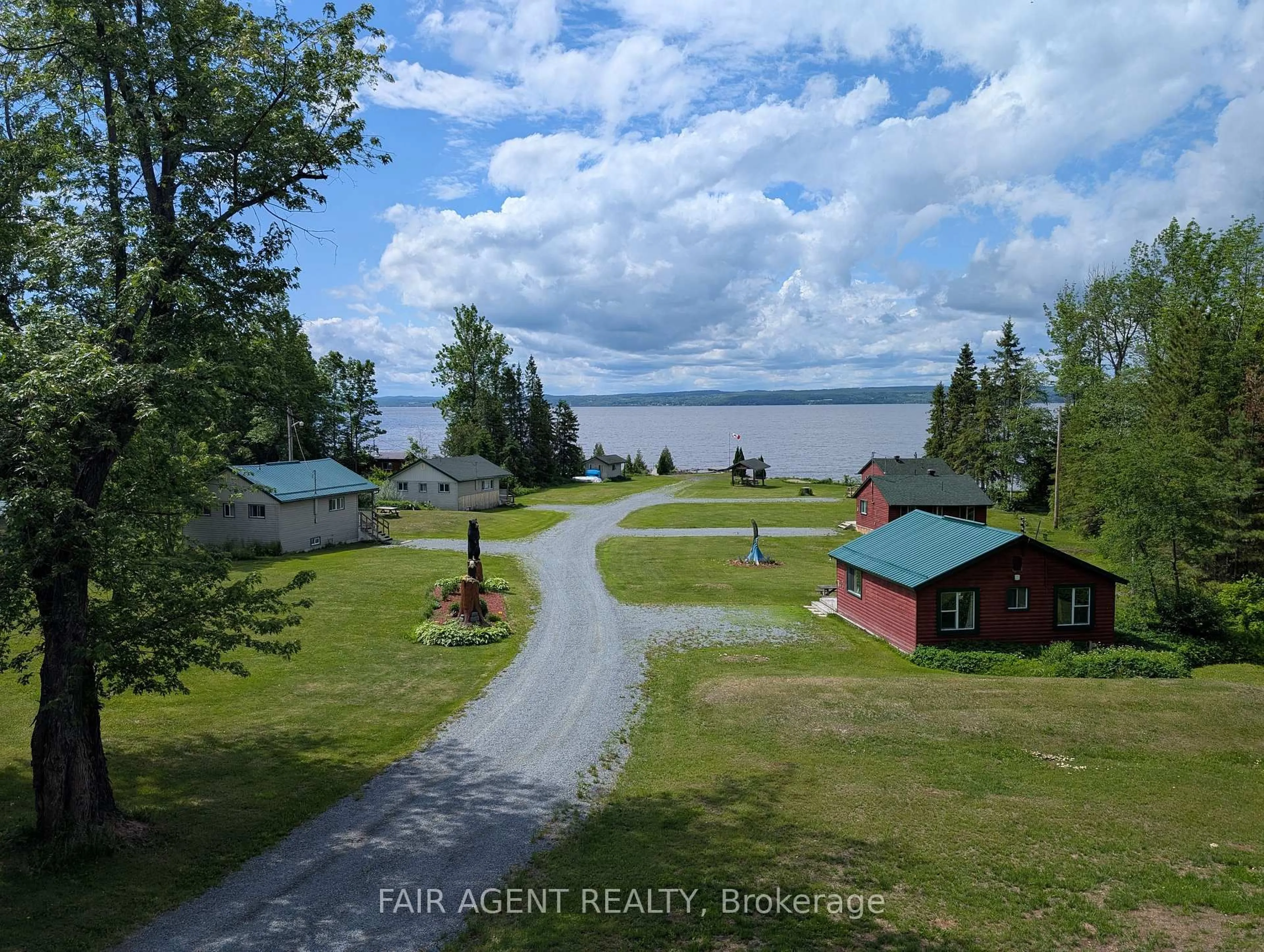 A pic from outside/outdoor area/front of a property/back of a property/a pic from drone, water/lake/river/ocean view for 743022 & 743024 Dawson Point Rd, Timiskaming Ontario P0J 1P0
