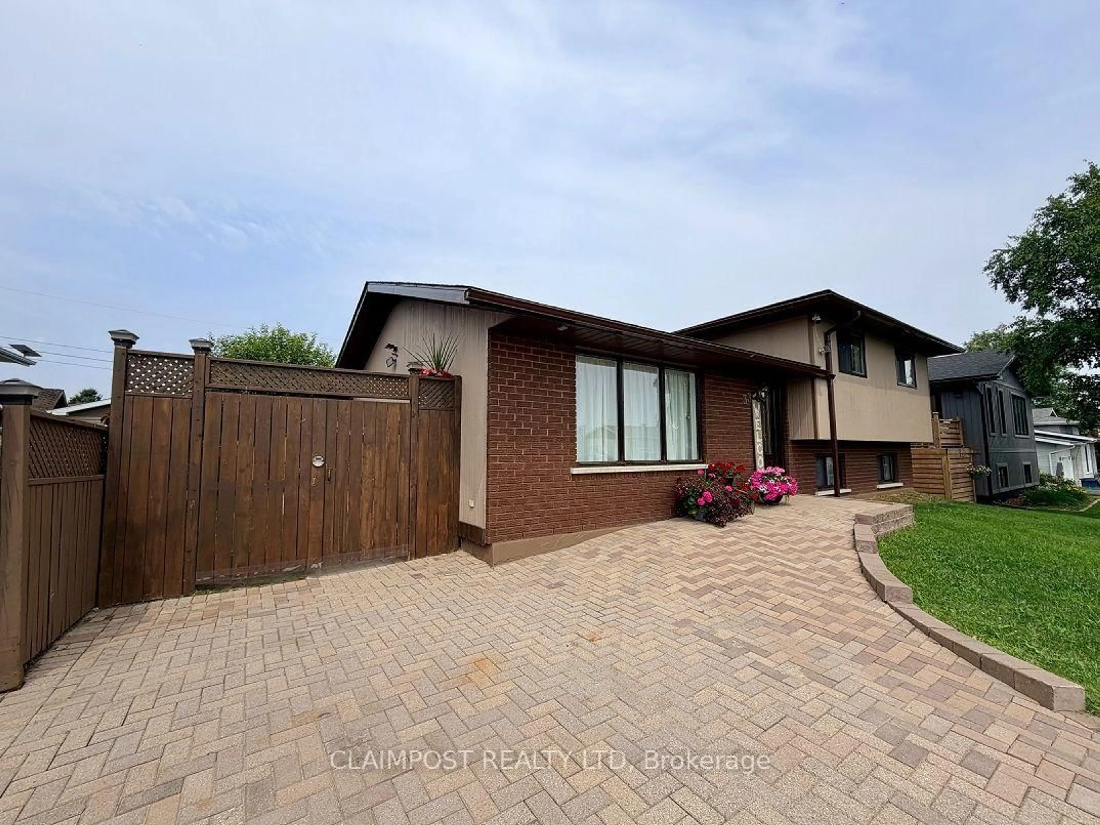 Home with brick exterior material, street for 33 Algonquin Rd, Cochrane Ontario P0L 1C0