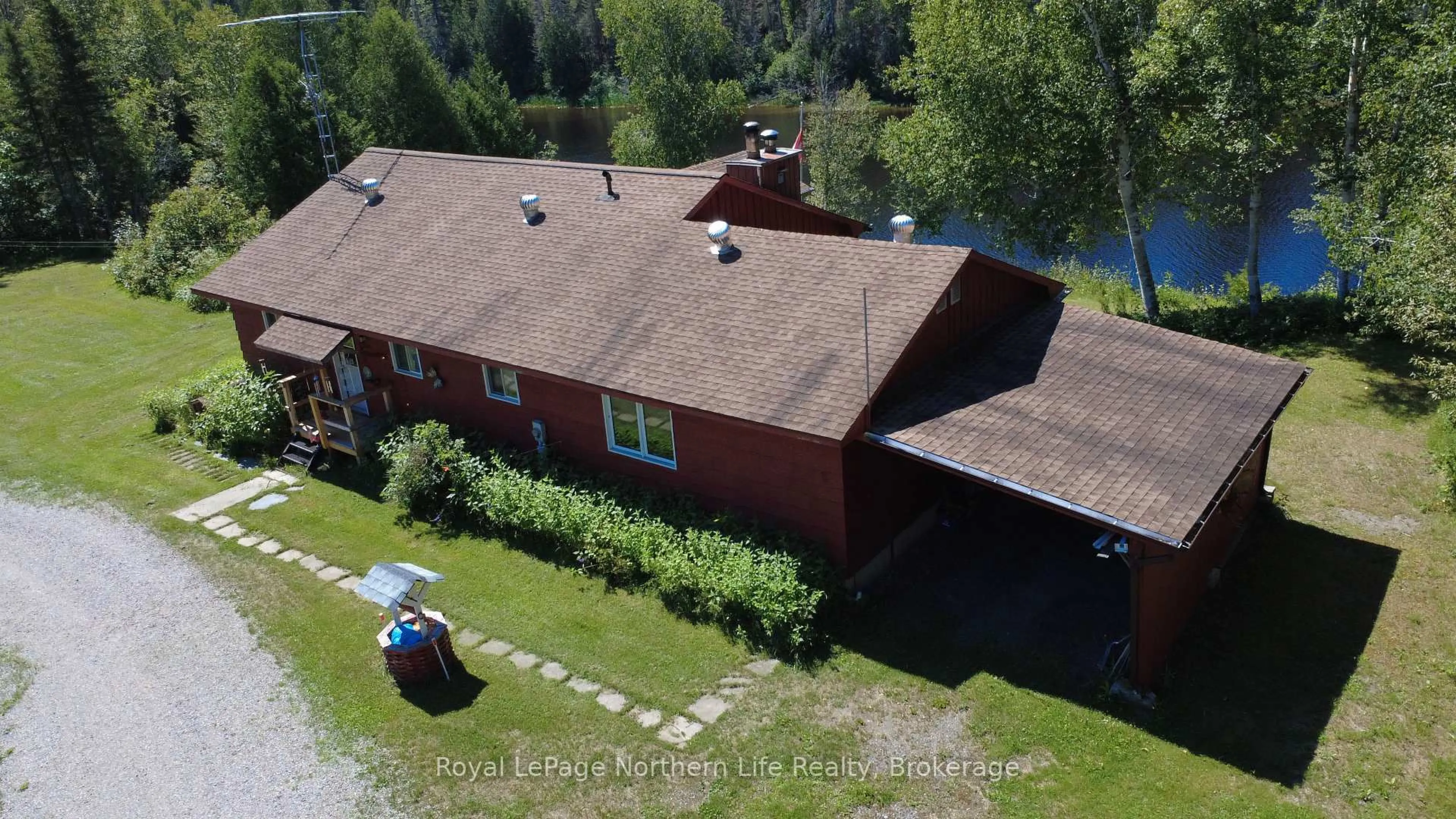 A pic from outside/outdoor area/front of a property/back of a property/a pic from drone, water/lake/river/ocean view for 65 Highway, Timiskaming Ontario P0J 1M0
