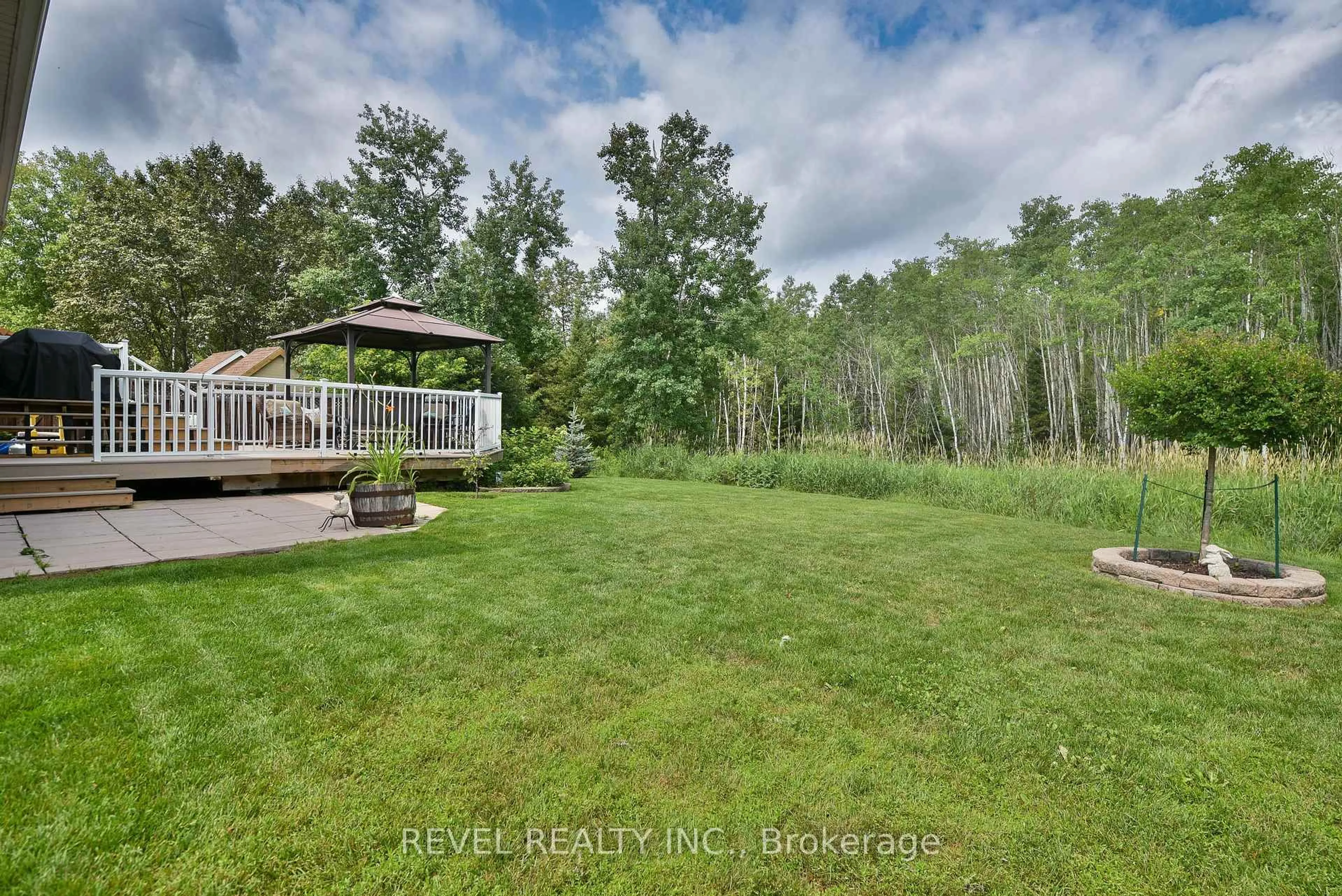 A pic from outside/outdoor area/front of a property/back of a property/a pic from drone, forest/trees view for 304 JV Bonhomme Blvd, Timmins Ontario P4P 1H5