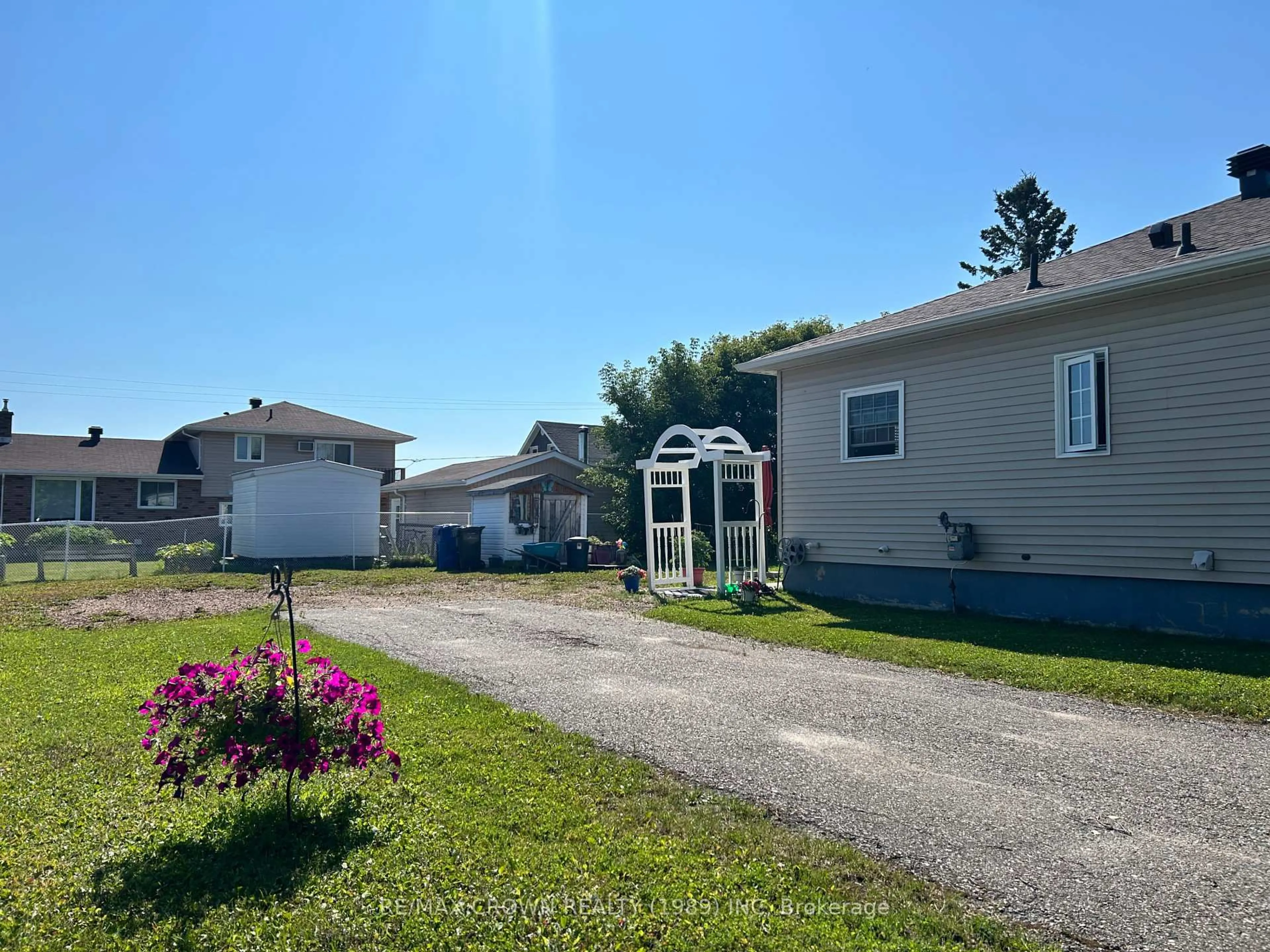 A pic from outside/outdoor area/front of a property/back of a property/a pic from drone, unknown for 12 Erickson Ave, Kapuskasing Ontario P5N 2K7