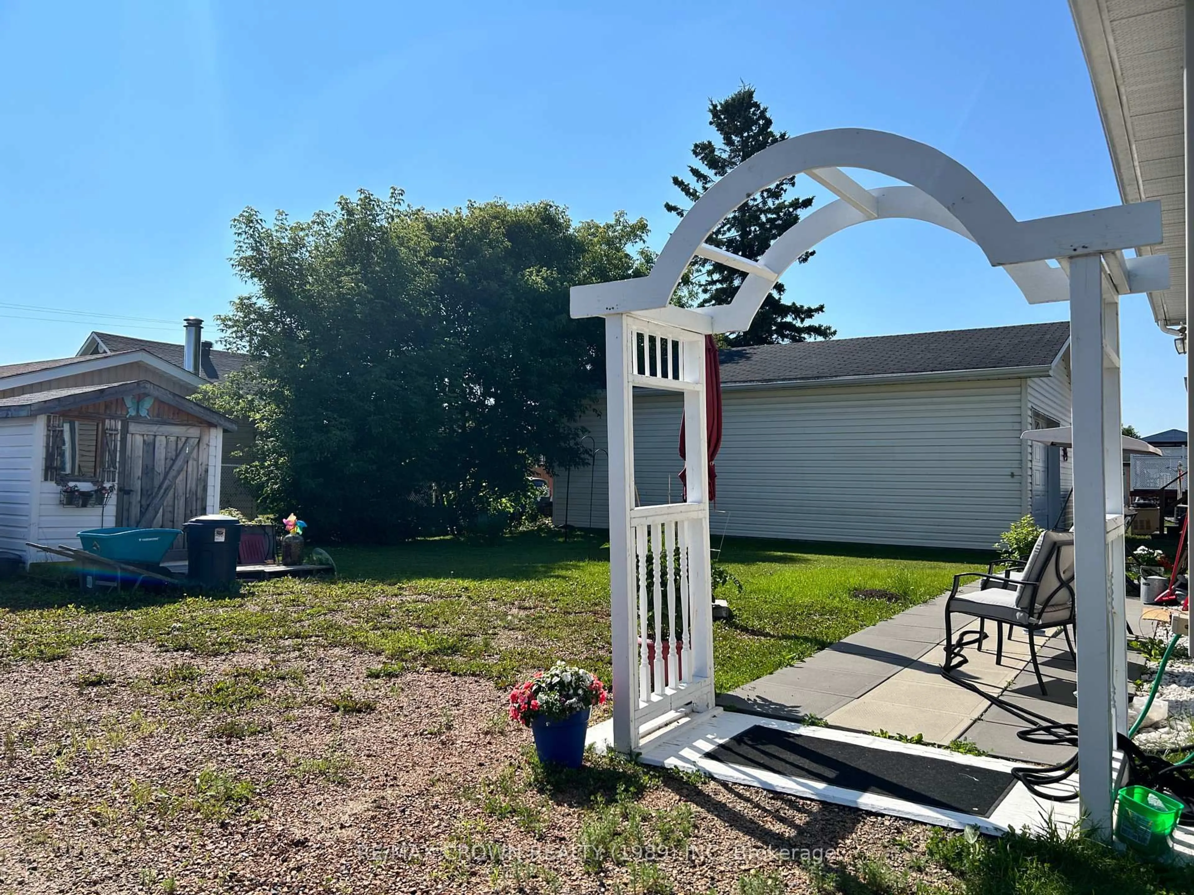 A pic from outside/outdoor area/front of a property/back of a property/a pic from drone, unknown for 12 Erickson Ave, Kapuskasing Ontario P5N 2K7