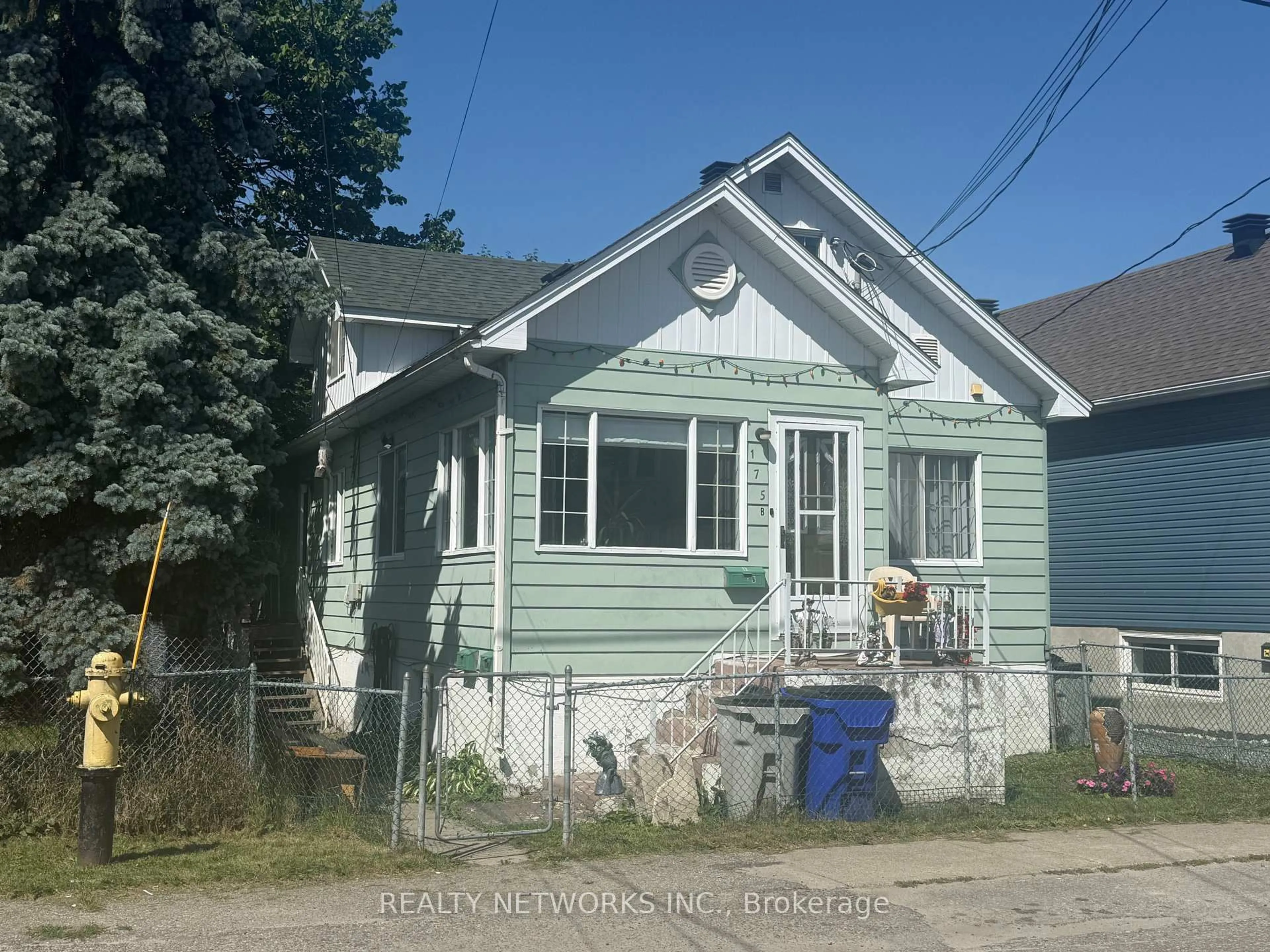 Home with vinyl exterior material, building for 175 Elm St, Timmins Ontario P4N 6A6