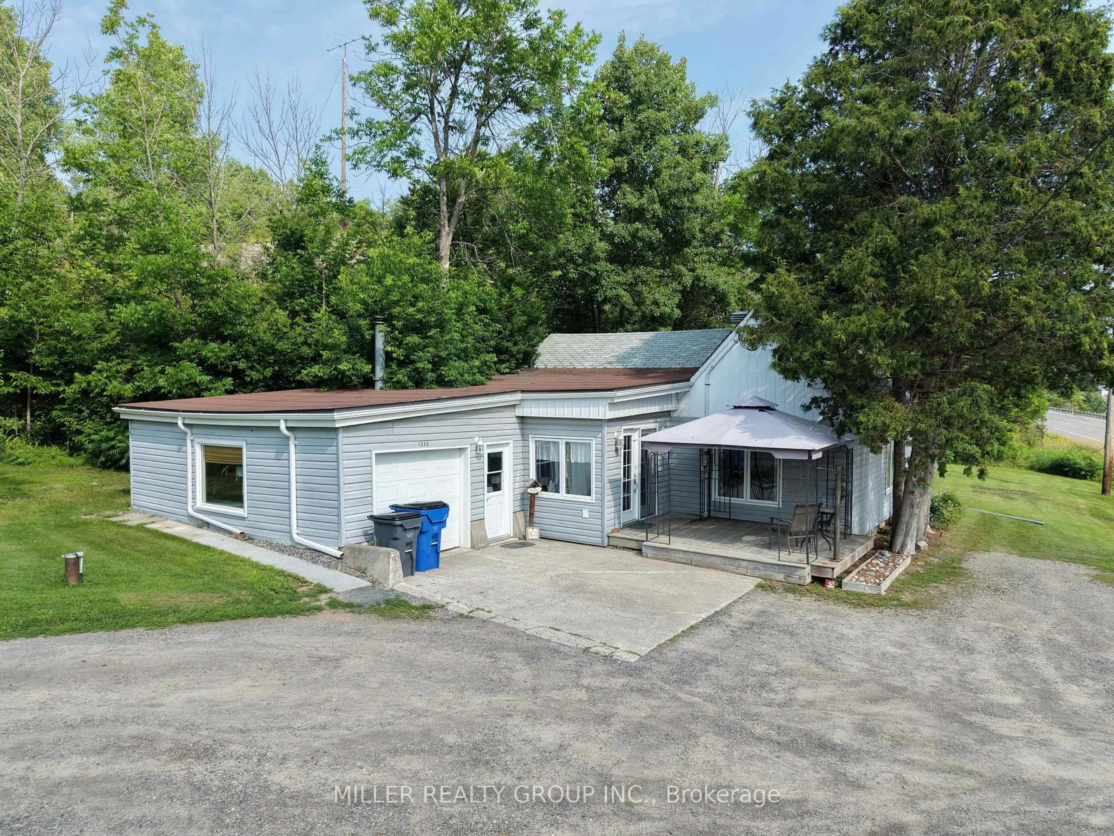 A pic from outside/outdoor area/front of a property/back of a property/a pic from drone, unknown for 1272 Lakeshore Rd, Temiskaming Shores Ontario P0J 1K0