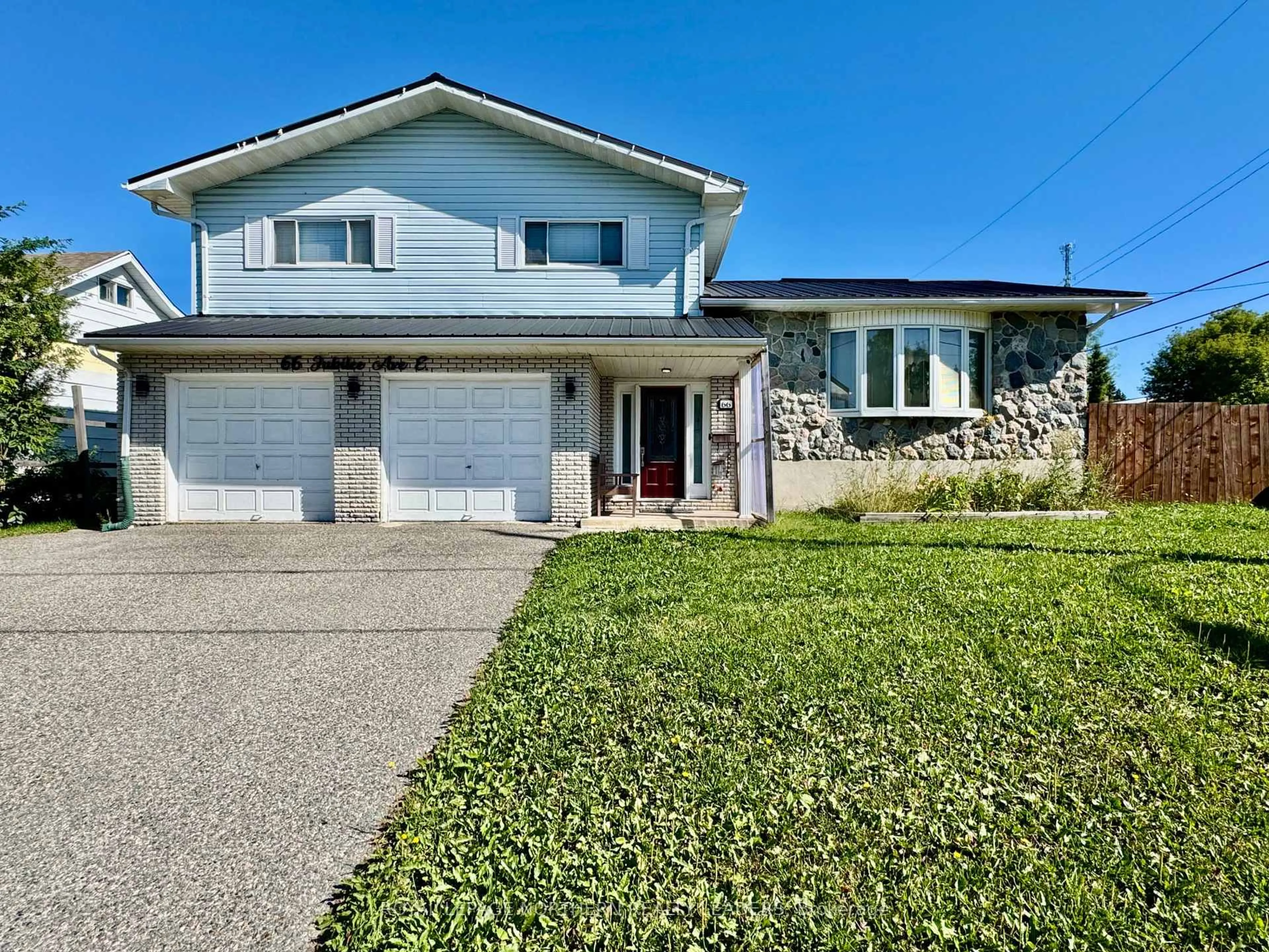 Home with vinyl exterior material, street for 66 Jubilee Ave, Timmins Ontario P4N 5W3
