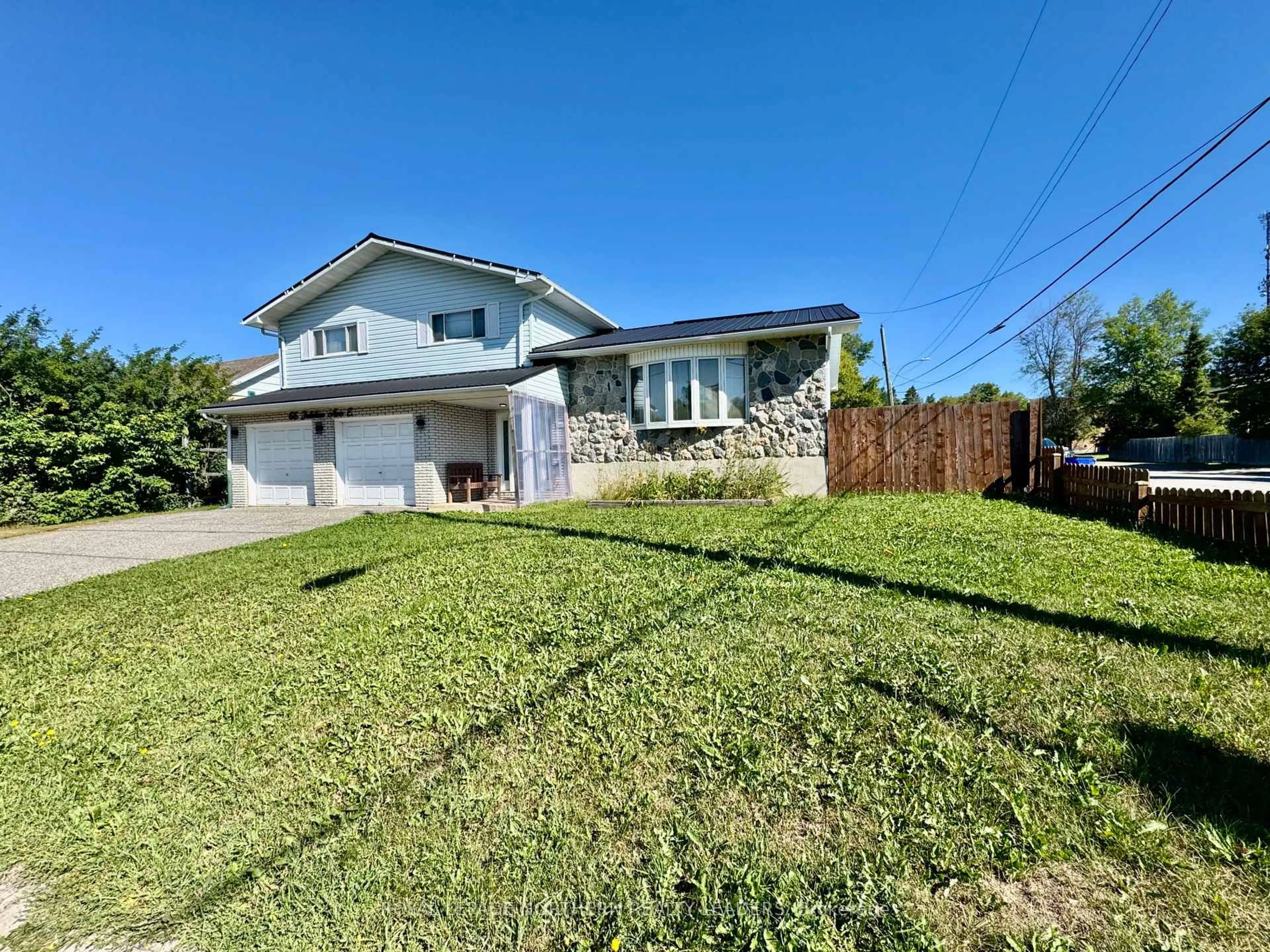 A pic from outside/outdoor area/front of a property/back of a property/a pic from drone, street for 66 Jubilee Ave, Timmins Ontario P4N 5W3