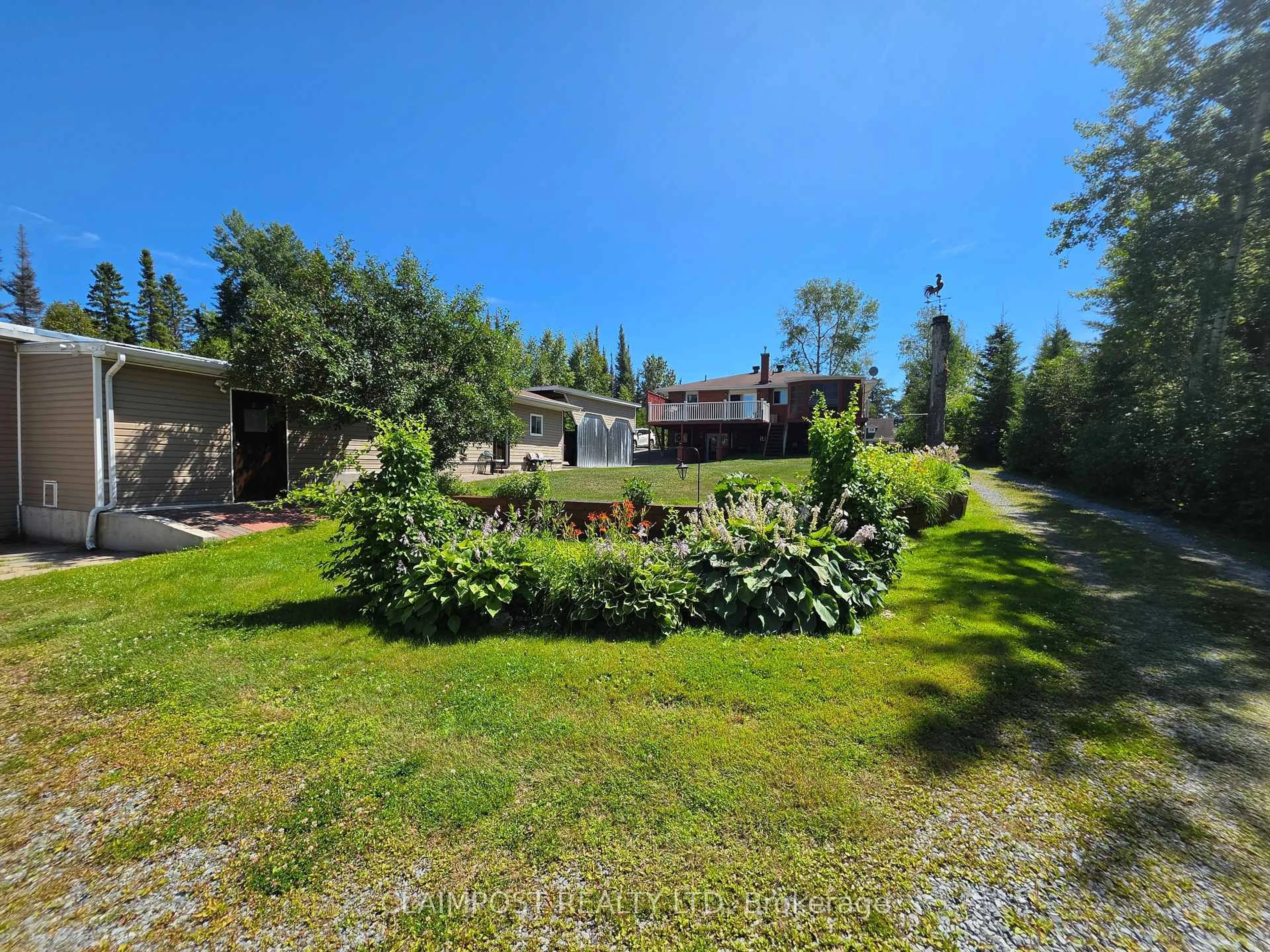 A pic from outside/outdoor area/front of a property/back of a property/a pic from drone, forest/trees view for 2814 Dalton Rd, Timmins Ontario P4N 7C2