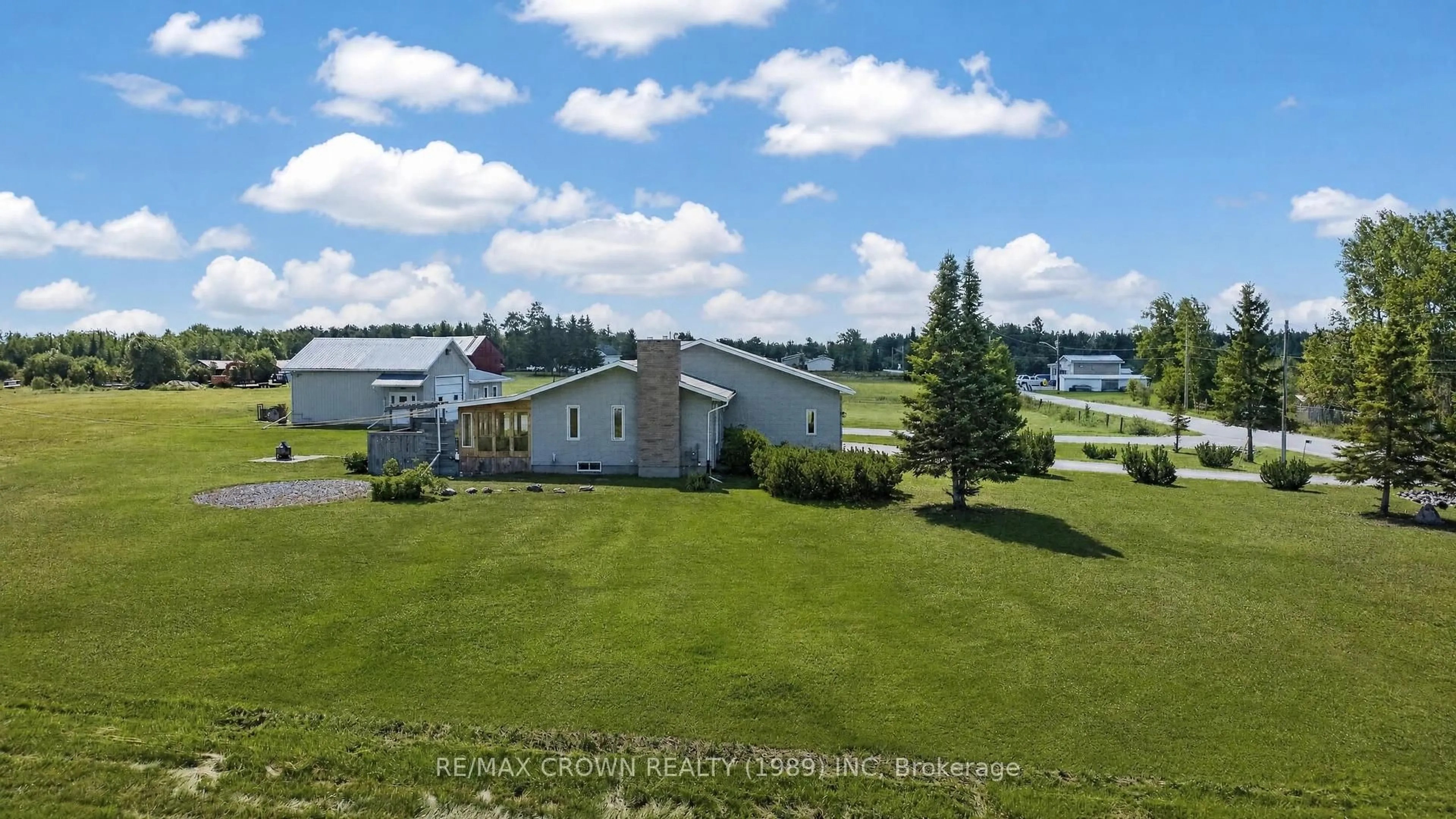 A pic from outside/outdoor area/front of a property/back of a property/a pic from drone, water/lake/river/ocean view for 53 Cloutier Rd, Hearst Ontario P0L 1N0