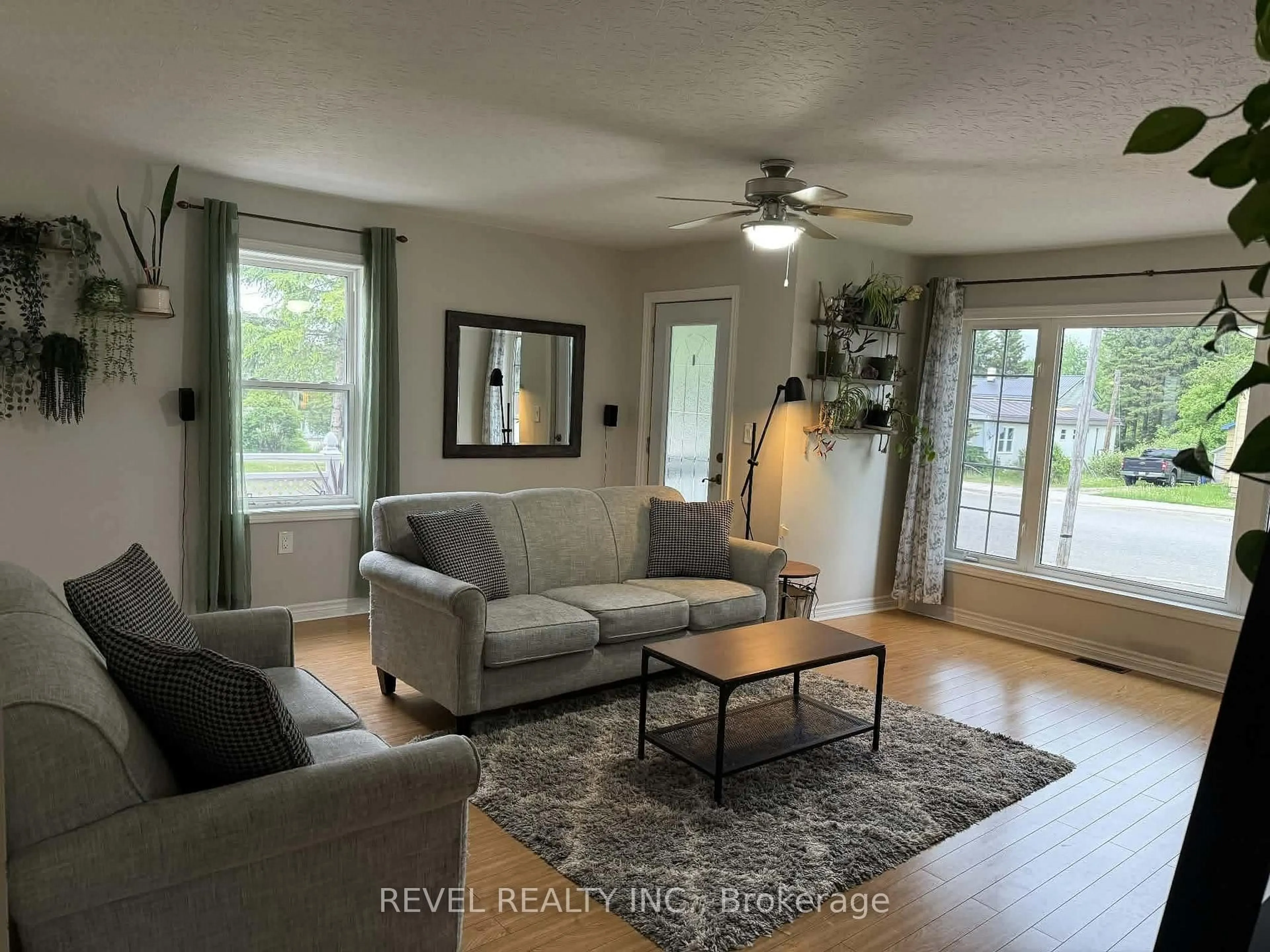 Living room with furniture, wood/laminate floor for 445 Fourth Ave, Black River-Matheson Ontario P0K 1N0