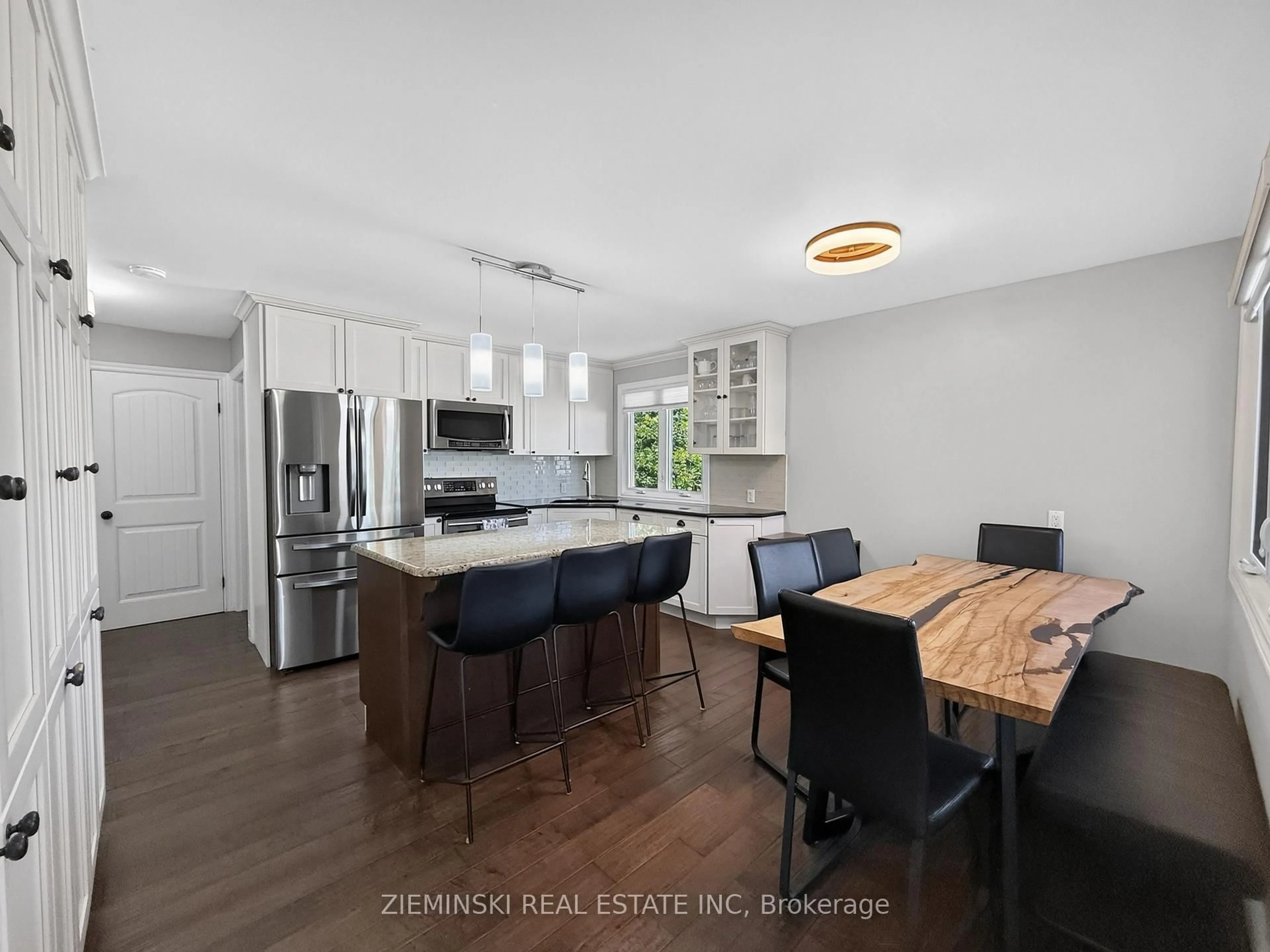 Open concept kitchen, wood/laminate floor for 403 Young St, Timmins Ontario P0N 1C0