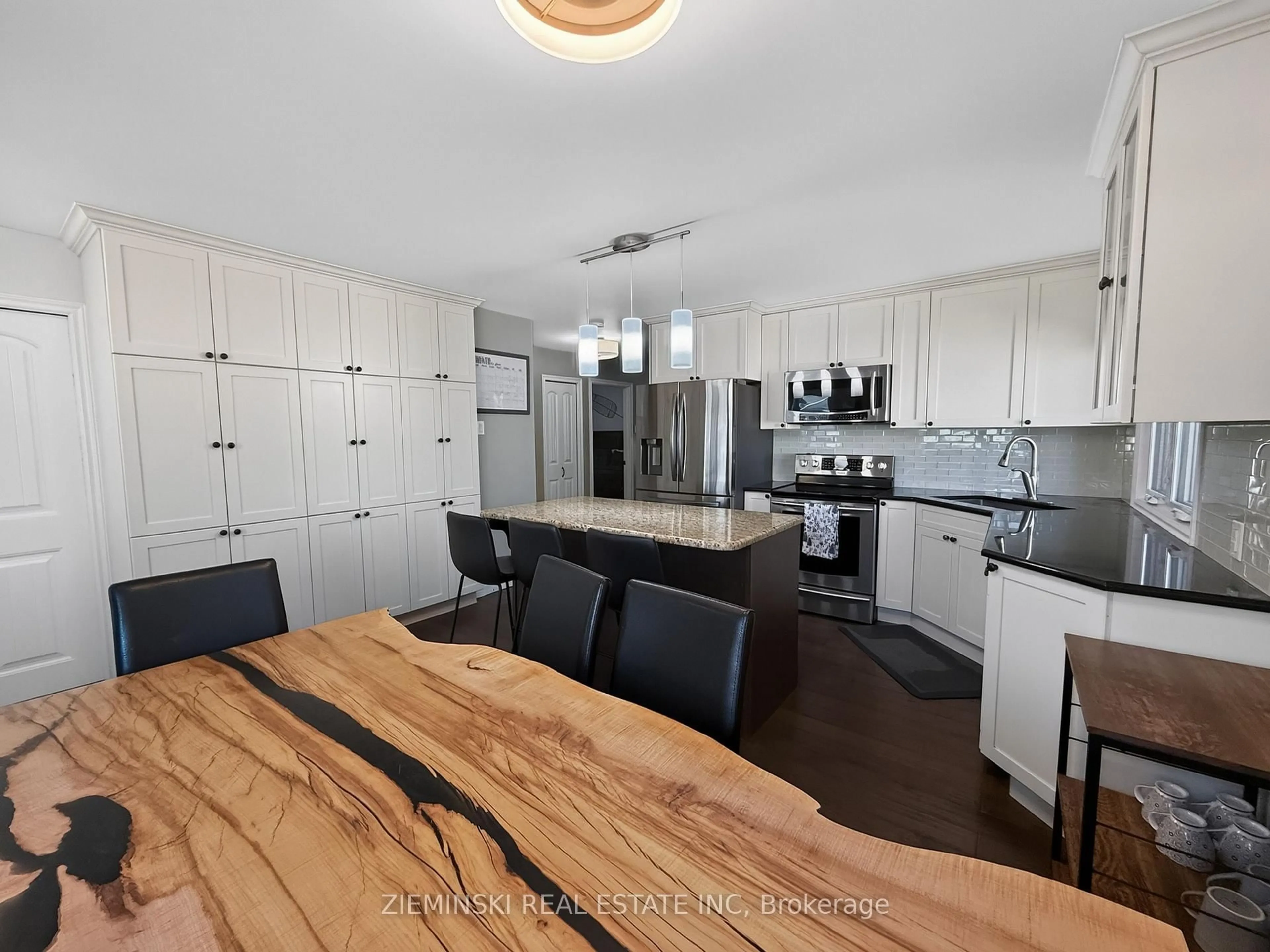 Open concept kitchen, wood/laminate floor for 403 Young St, Timmins Ontario P0N 1C0
