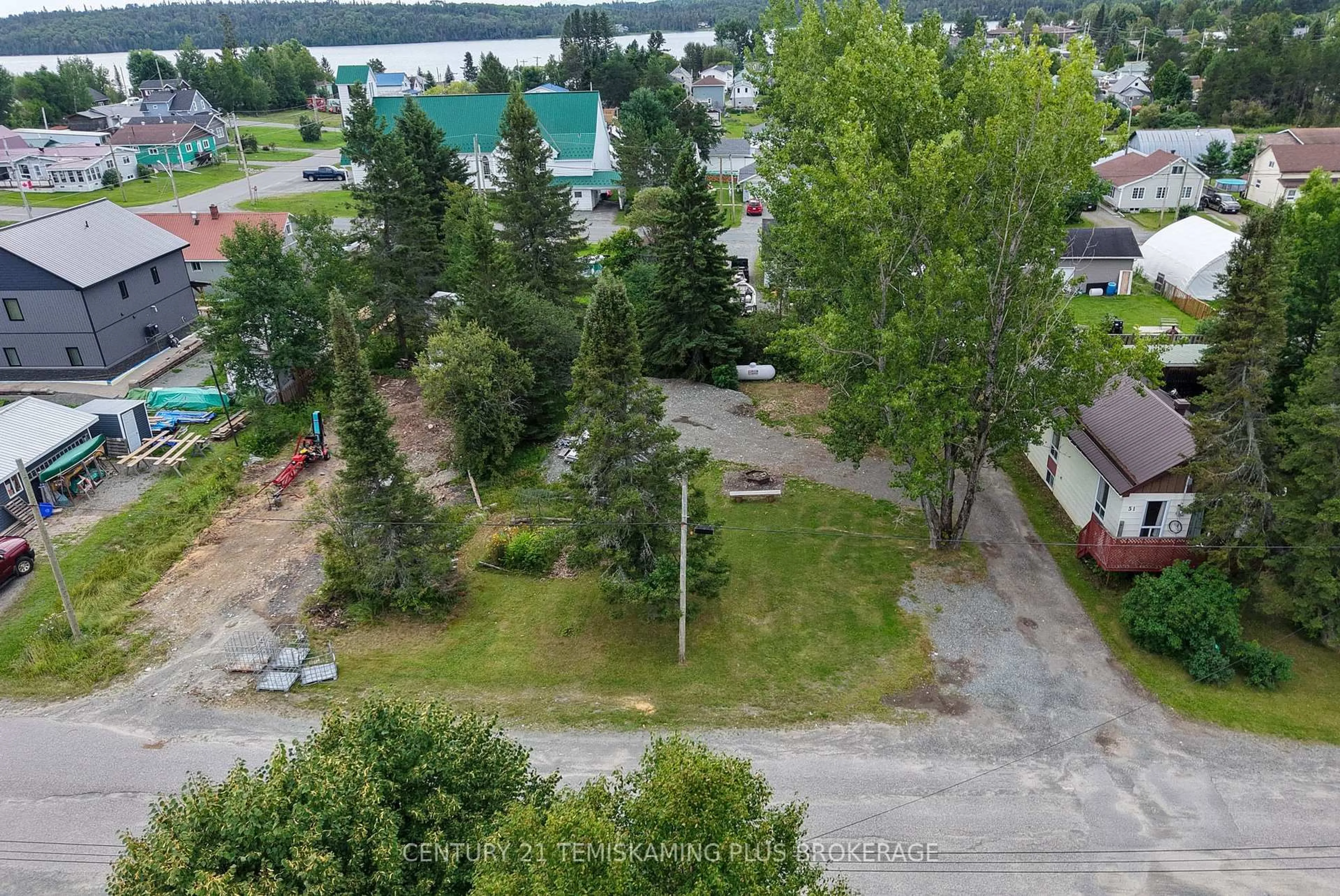A pic from outside/outdoor area/front of a property/back of a property/a pic from drone, unknown for 51 Third Ave, Kirkland Lake Ontario P0K 1L0