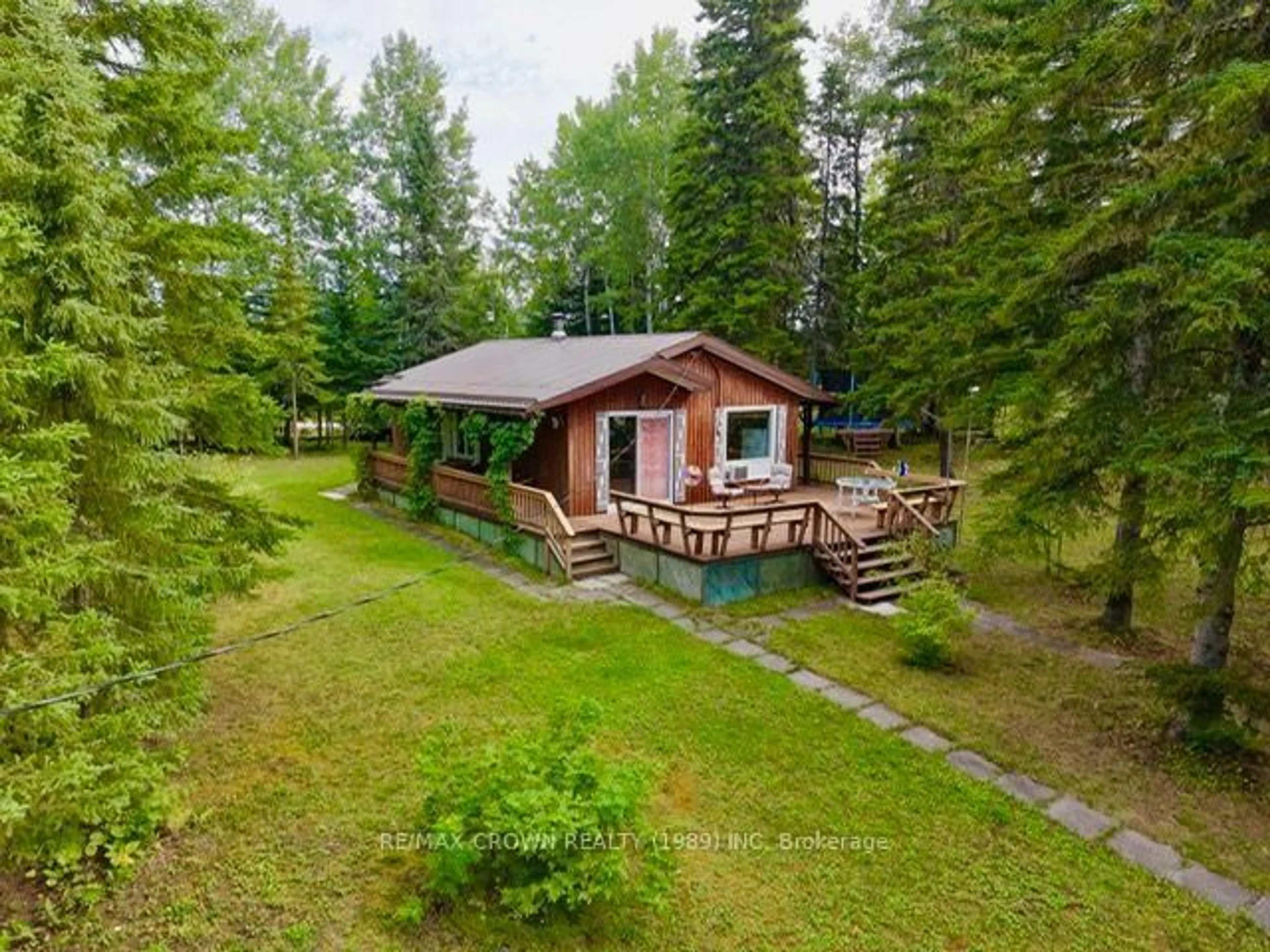 A pic from outside/outdoor area/front of a property/back of a property/a pic from drone, forest/trees view for 2 WEST BAY Rd, Hearst Ontario P0L 1N0